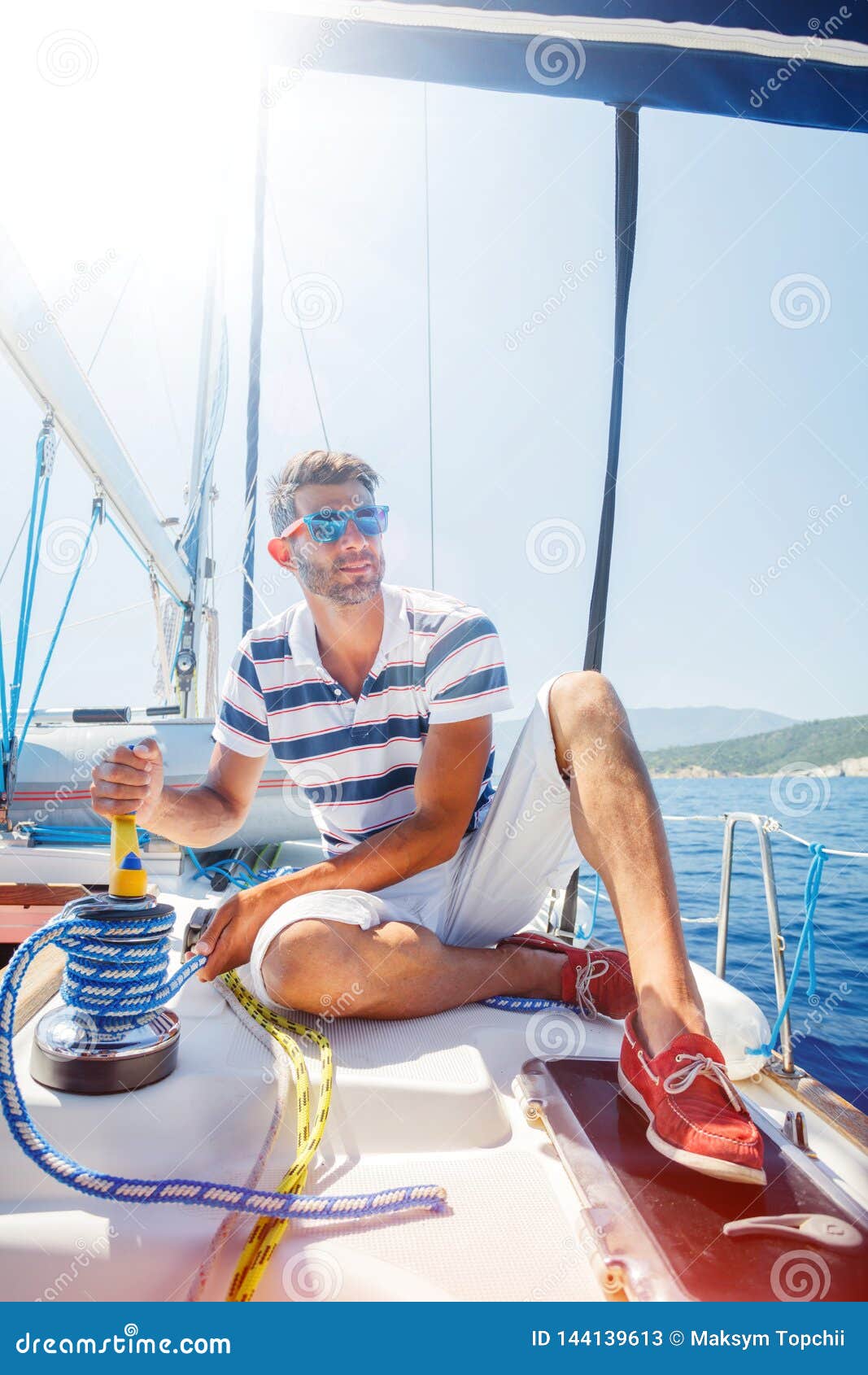 young man on a yacht