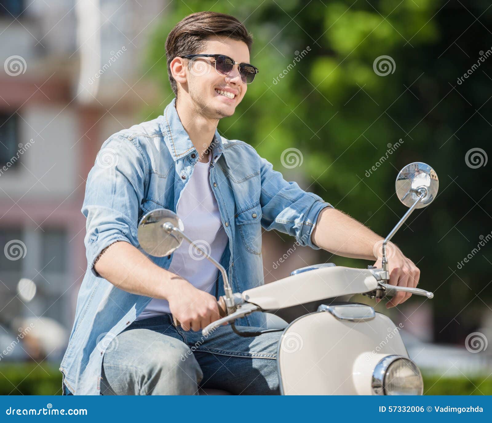 Young man on scooter stock photo. Image of riding, cool - 57332006