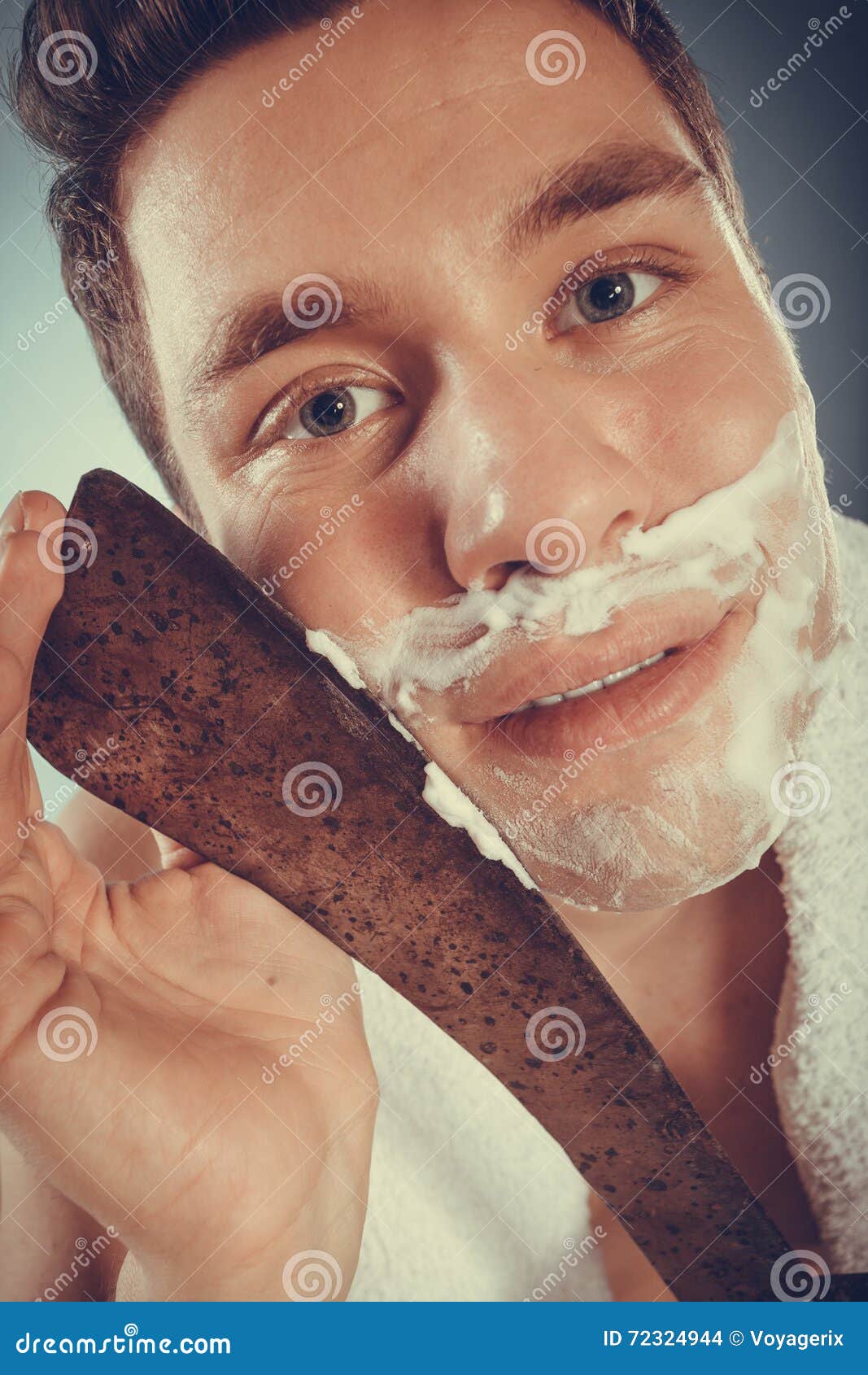 young-man-shaving-having-fun-machete-cream-foam-large-knife-handsome-guy-removing-beard-hair-skin-care-hygiene-humor-72324944.jpg