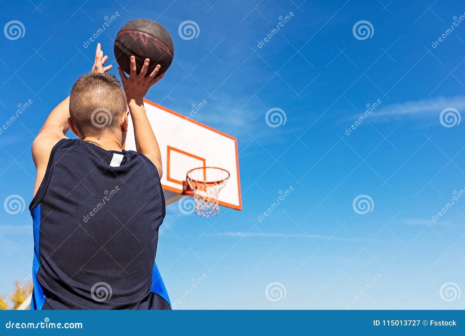 Young Man Shooting Free Throws from the Foul Line Stock Image Image