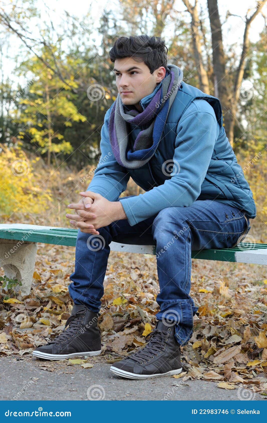 Young Man Sitting In Park. Royalty Free Stock Image - Image: 22983746