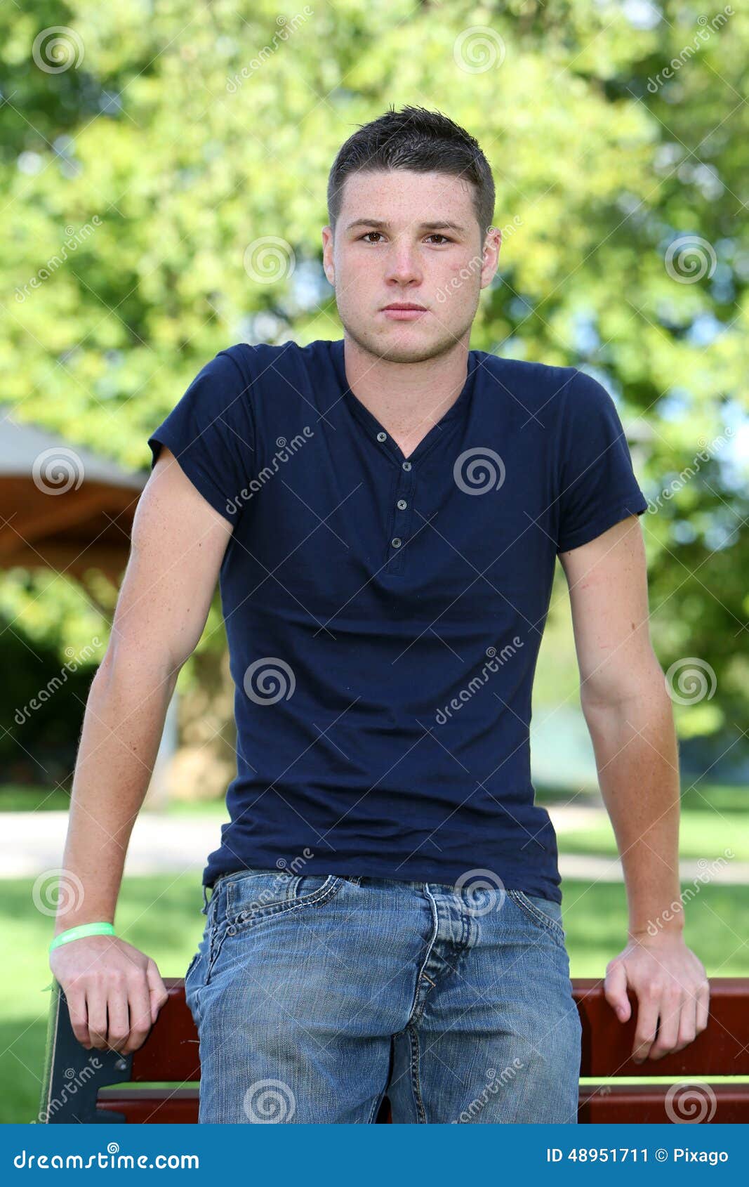 Young man stock image. Image of together, campus, grass - 48951711