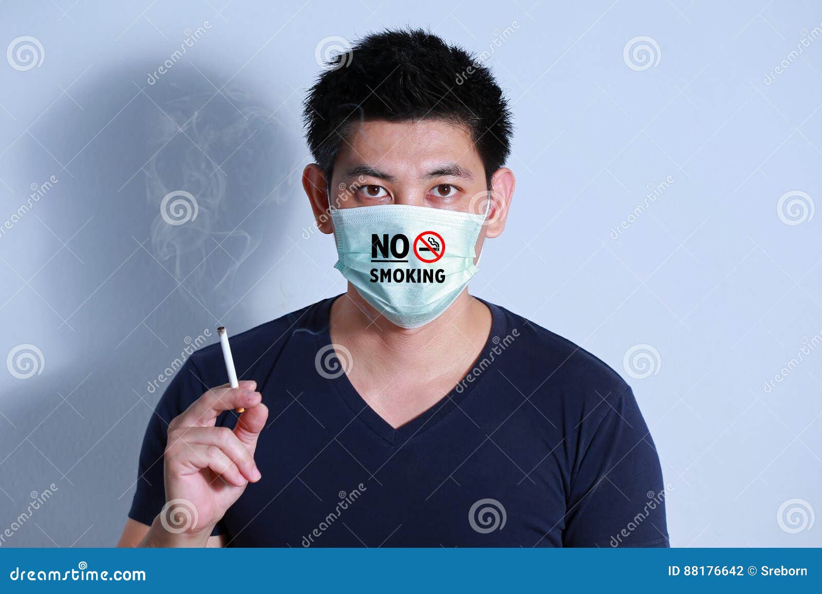 Young Man Smoking Cigarette with Protective Mask Stock Photo Image of