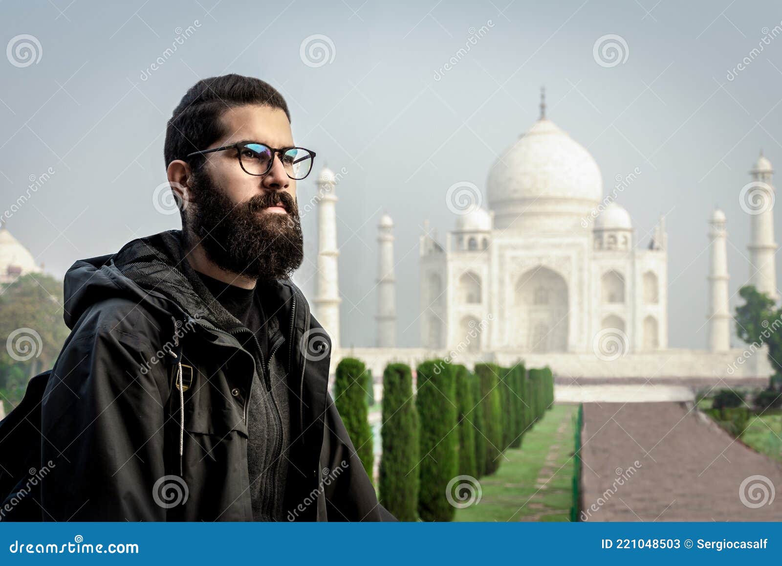 An Indian family wearing sunglasses poses to a photo in front of Taj Mahal  in Agra India Stock Photo  Alamy