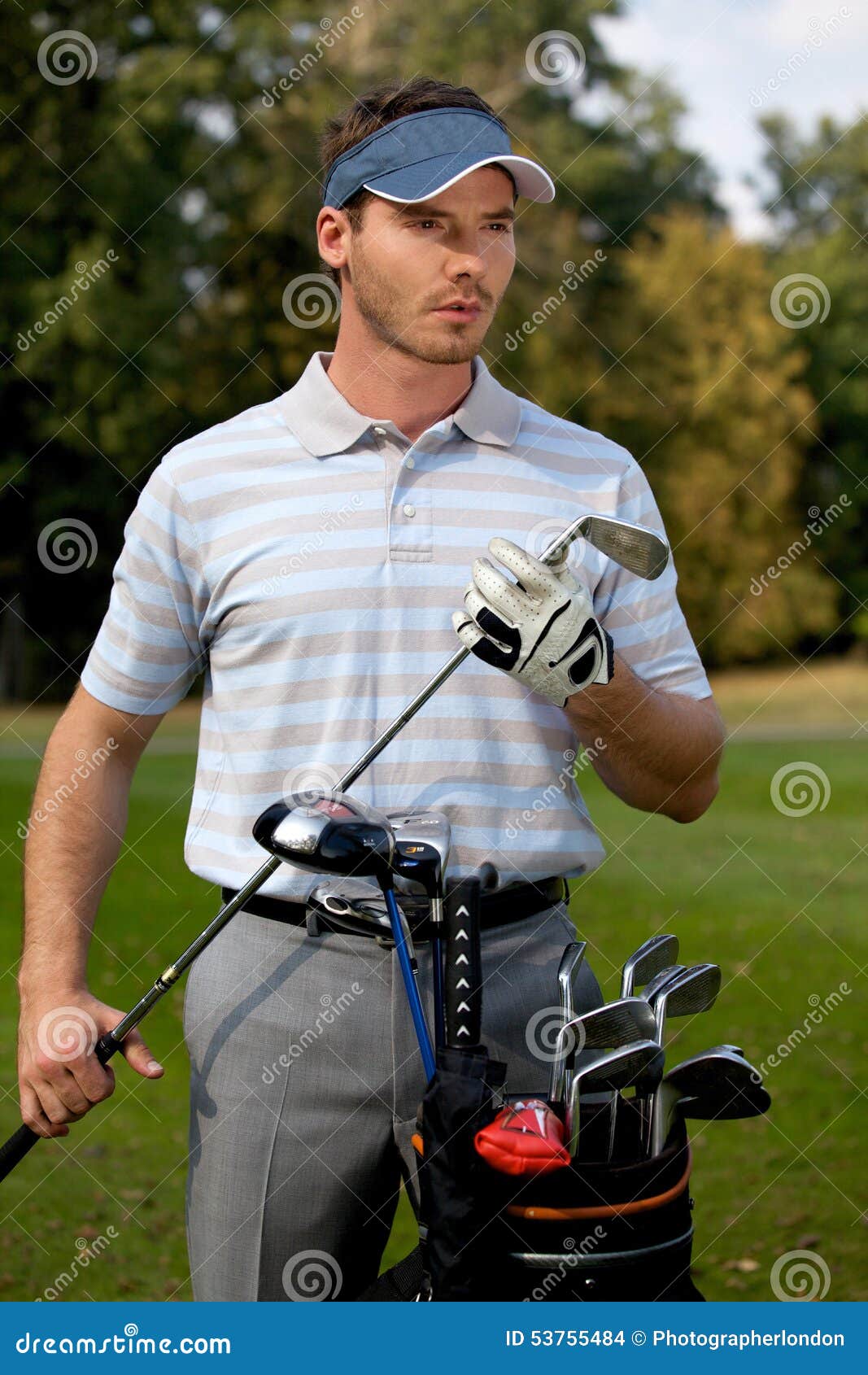 Young Man Standing by Golf Bag Full of Sticks Stock Photo Image of