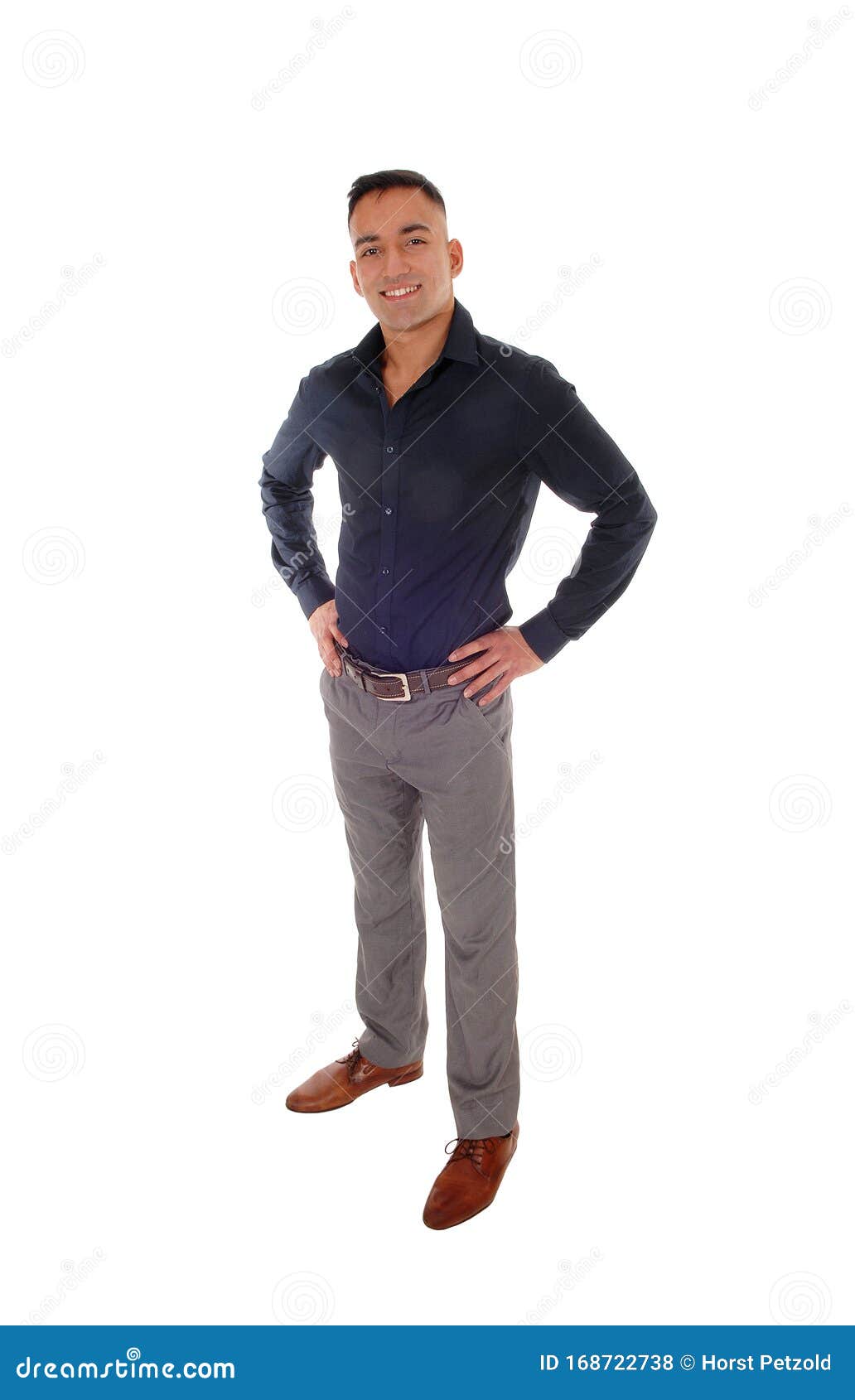 Young Man Standing With His Hands On His Hips Stock Photo Image Of