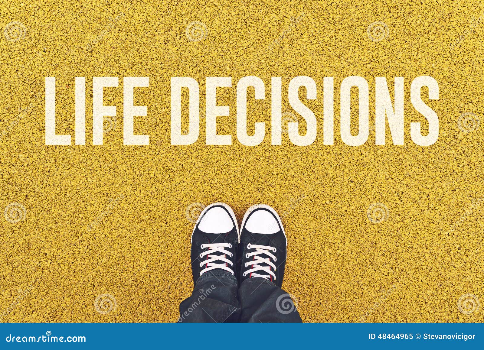young man standing at life decisions sign