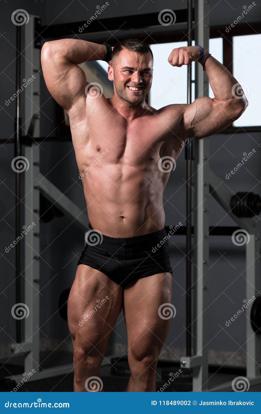Strong Athletic Man Shows Body And Abdominal Muscles Stock 