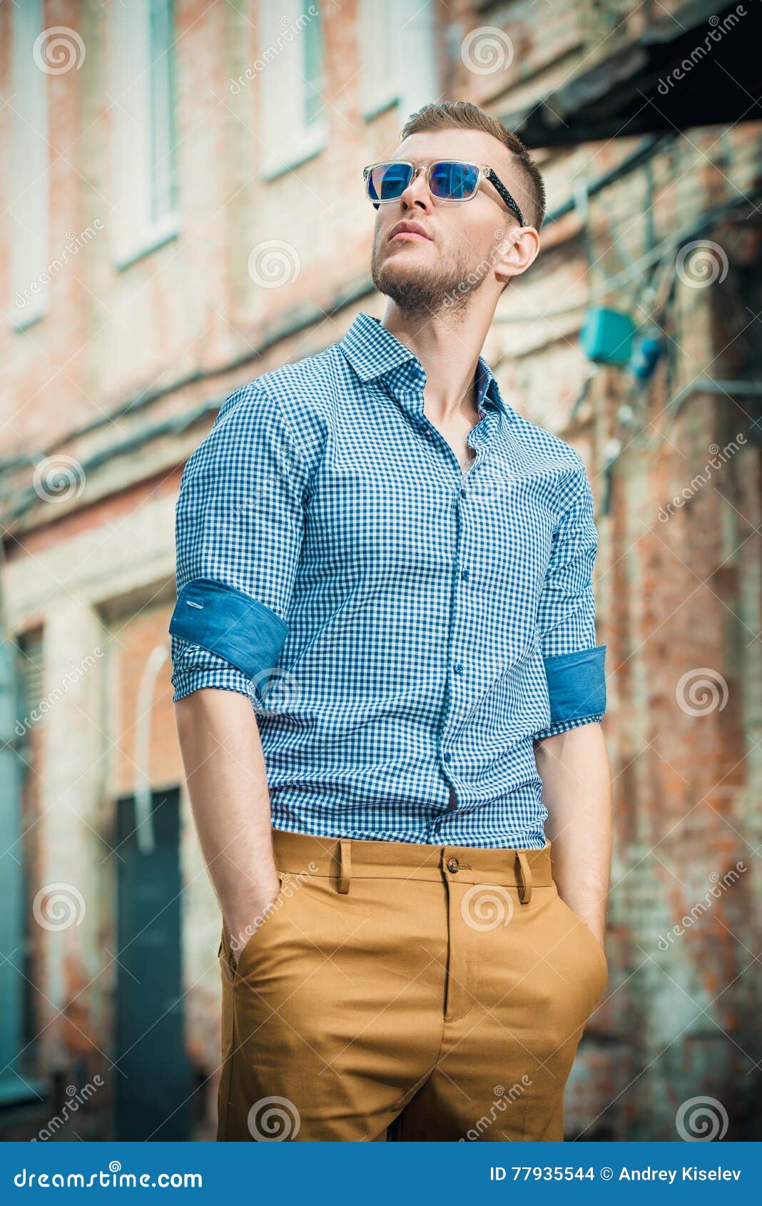 Young man on a street stock photo. Image of outdoors - 77935544