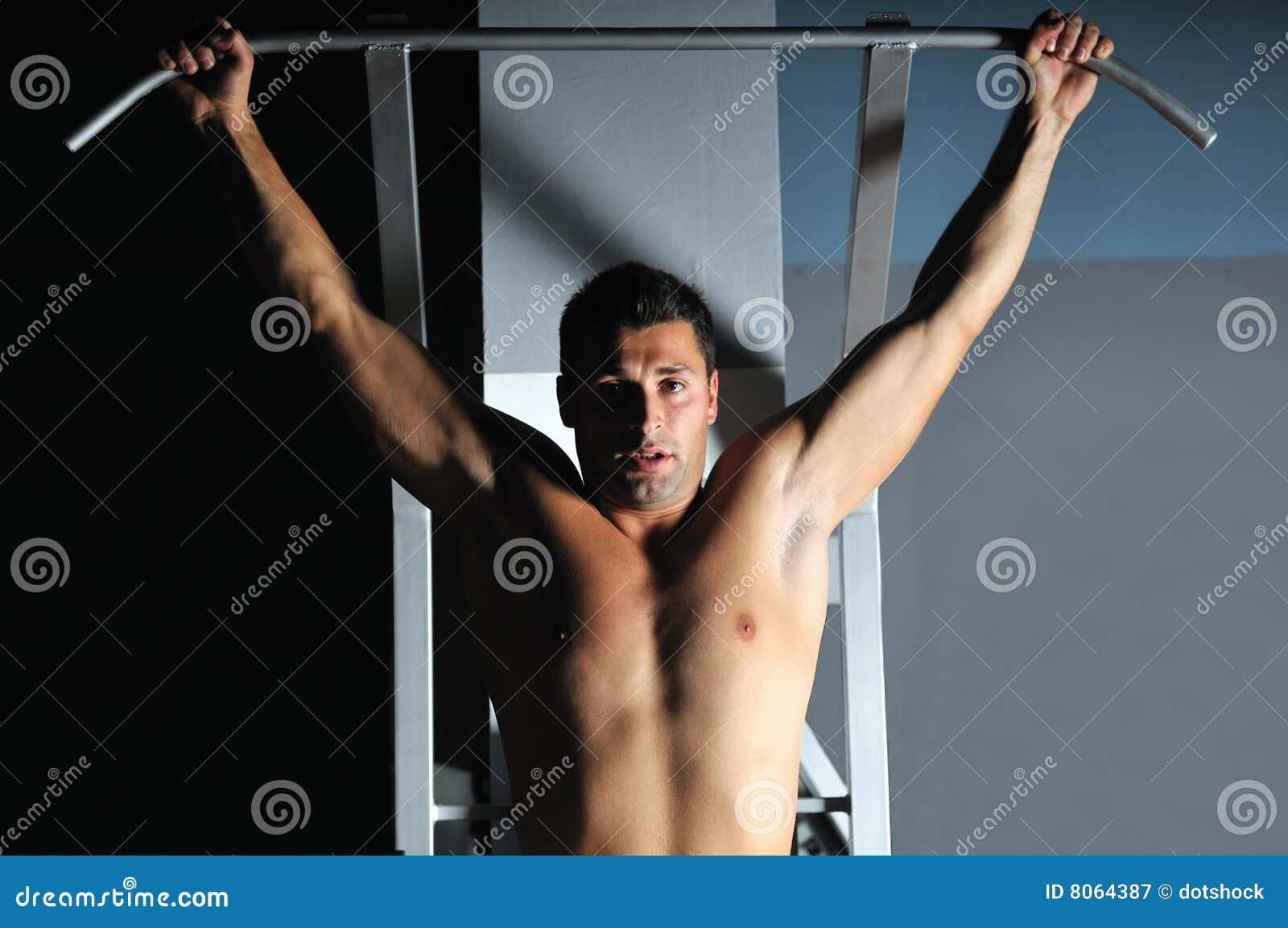 Young Man with Strong Arms Working Out in Gym Stock Image Image of