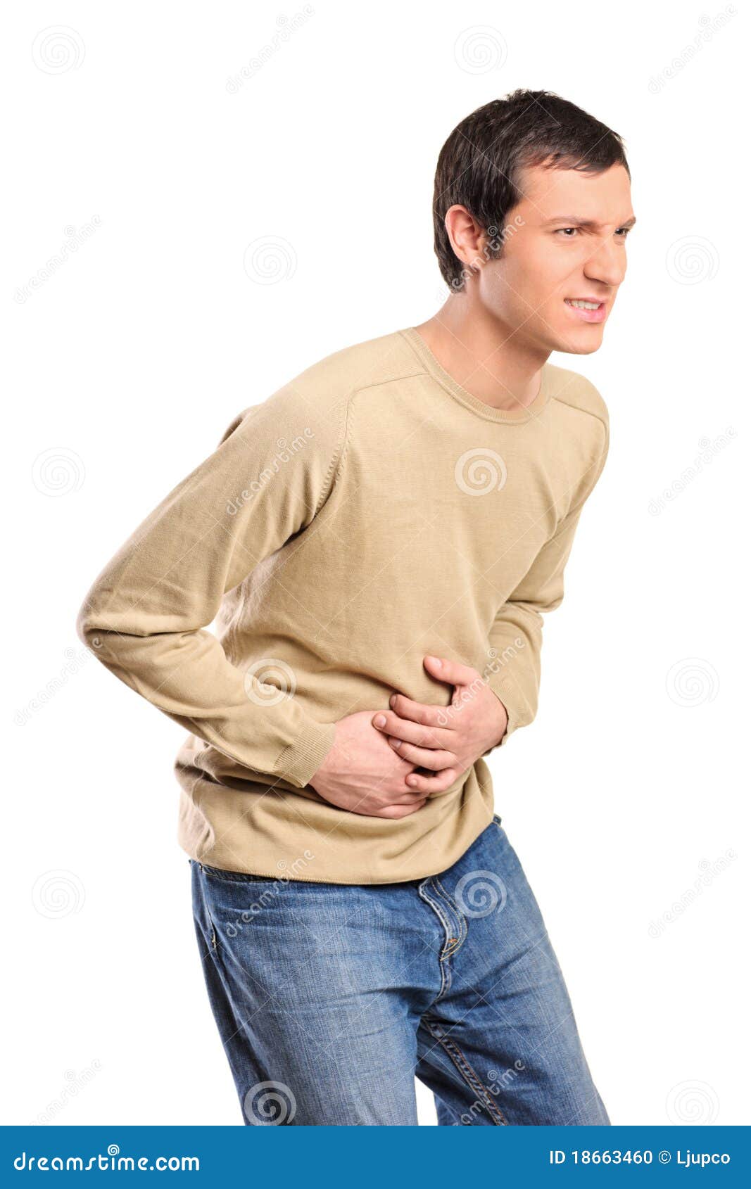 Young Man Suffering From A Bad Stomach Ache Pain Stock Photo Image Of young-man-suffering-from-a-bad-stomach-ache-pain-stock-photo-image-of