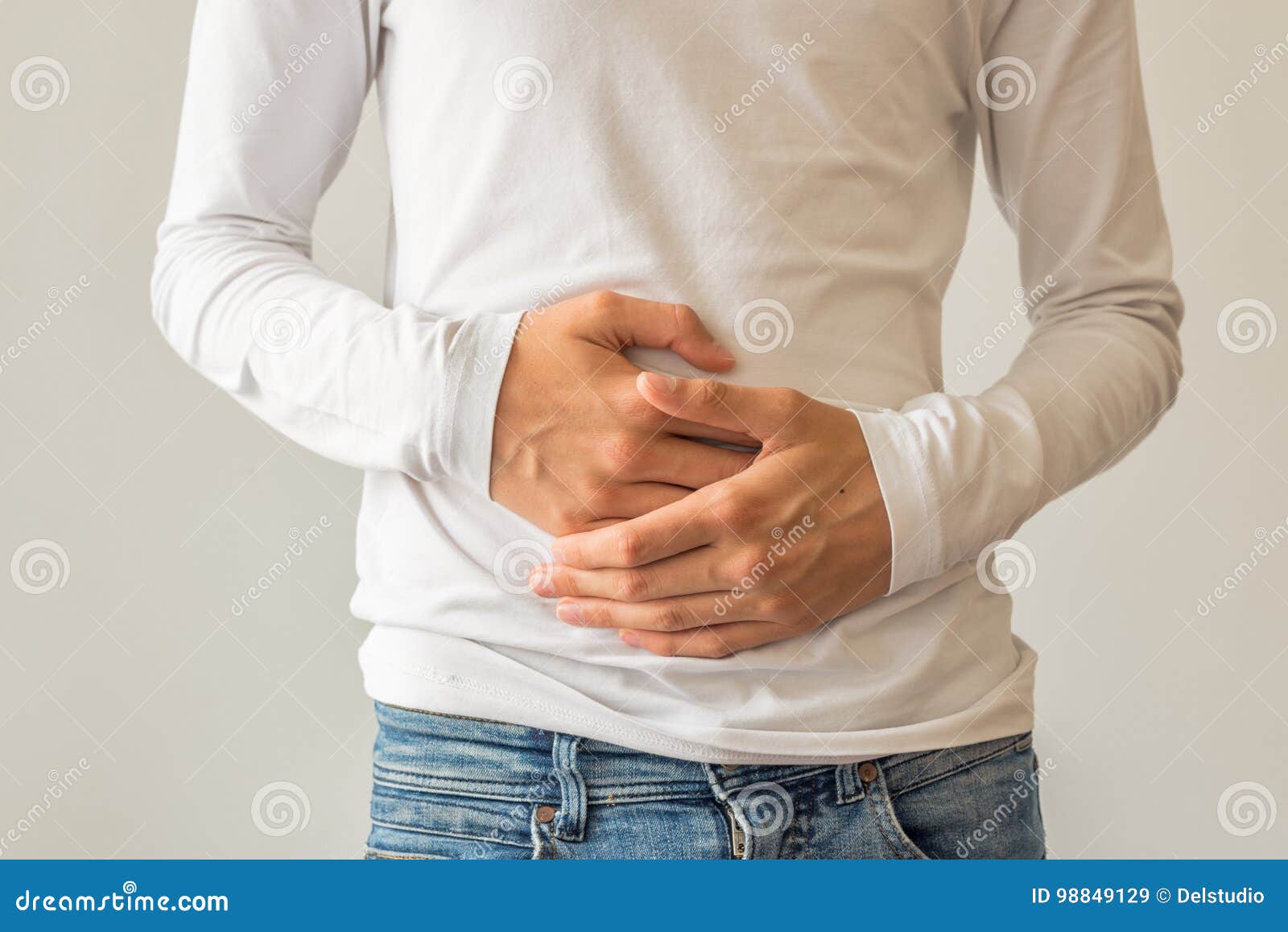 young man suffering from stomach ache diarrhea, constipation, acid reflux, indigestion, nausea