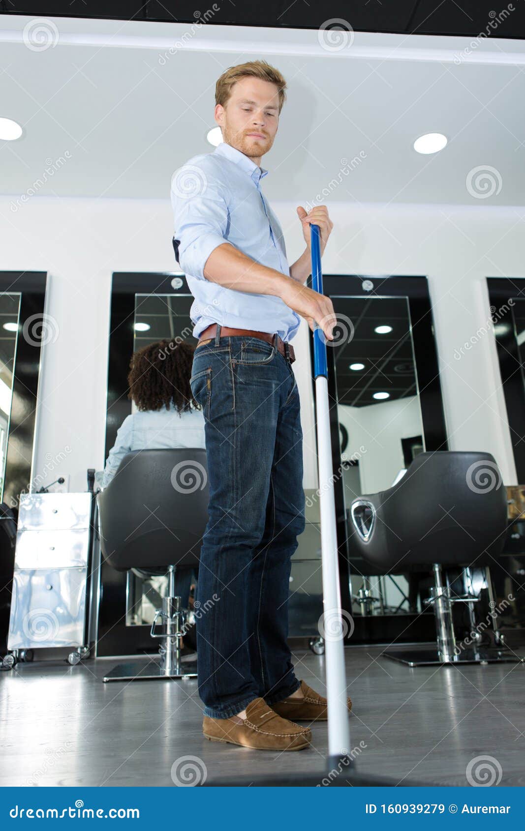 Young Man Sweeping Hair in Salon Stock Image Image of client, length