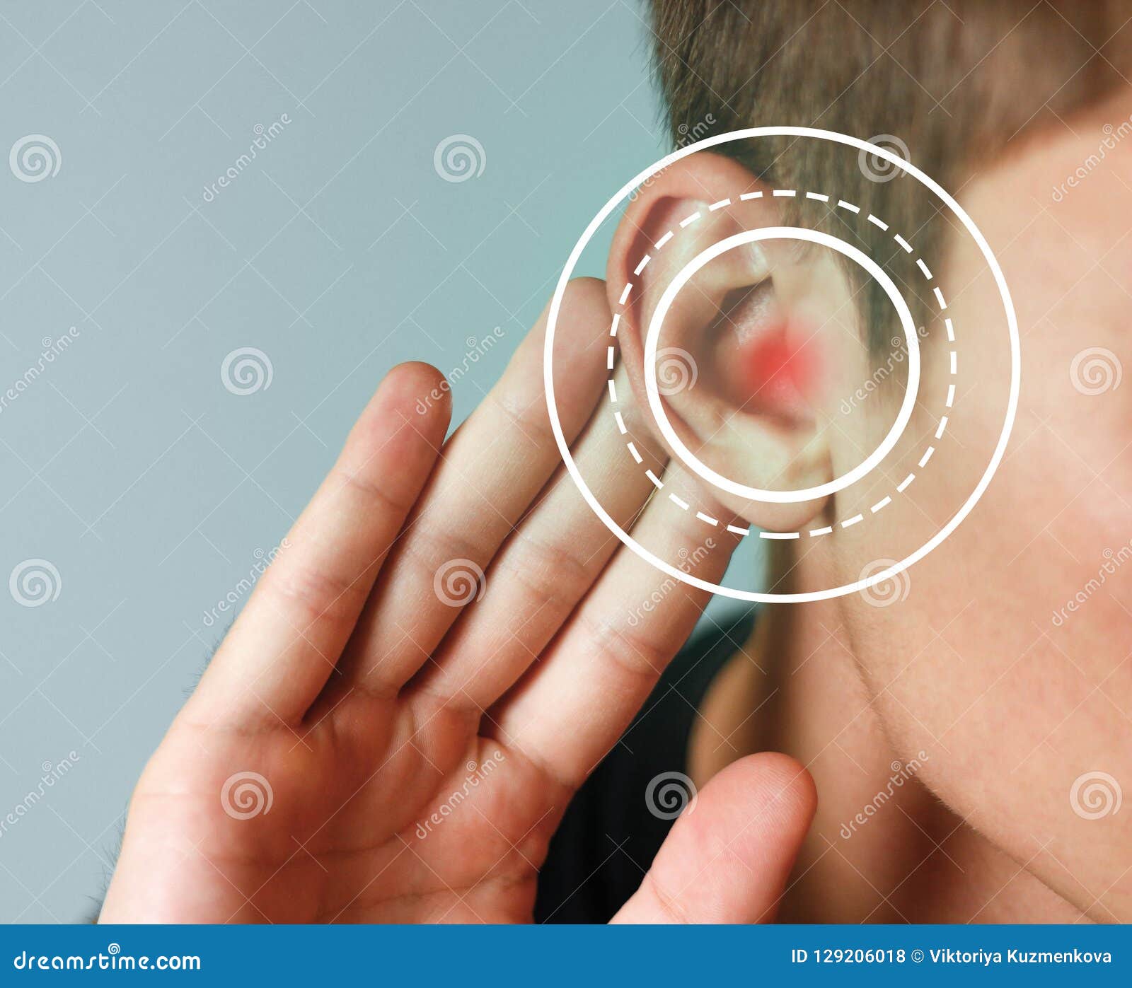 young man with symptom of hearing loss on color background