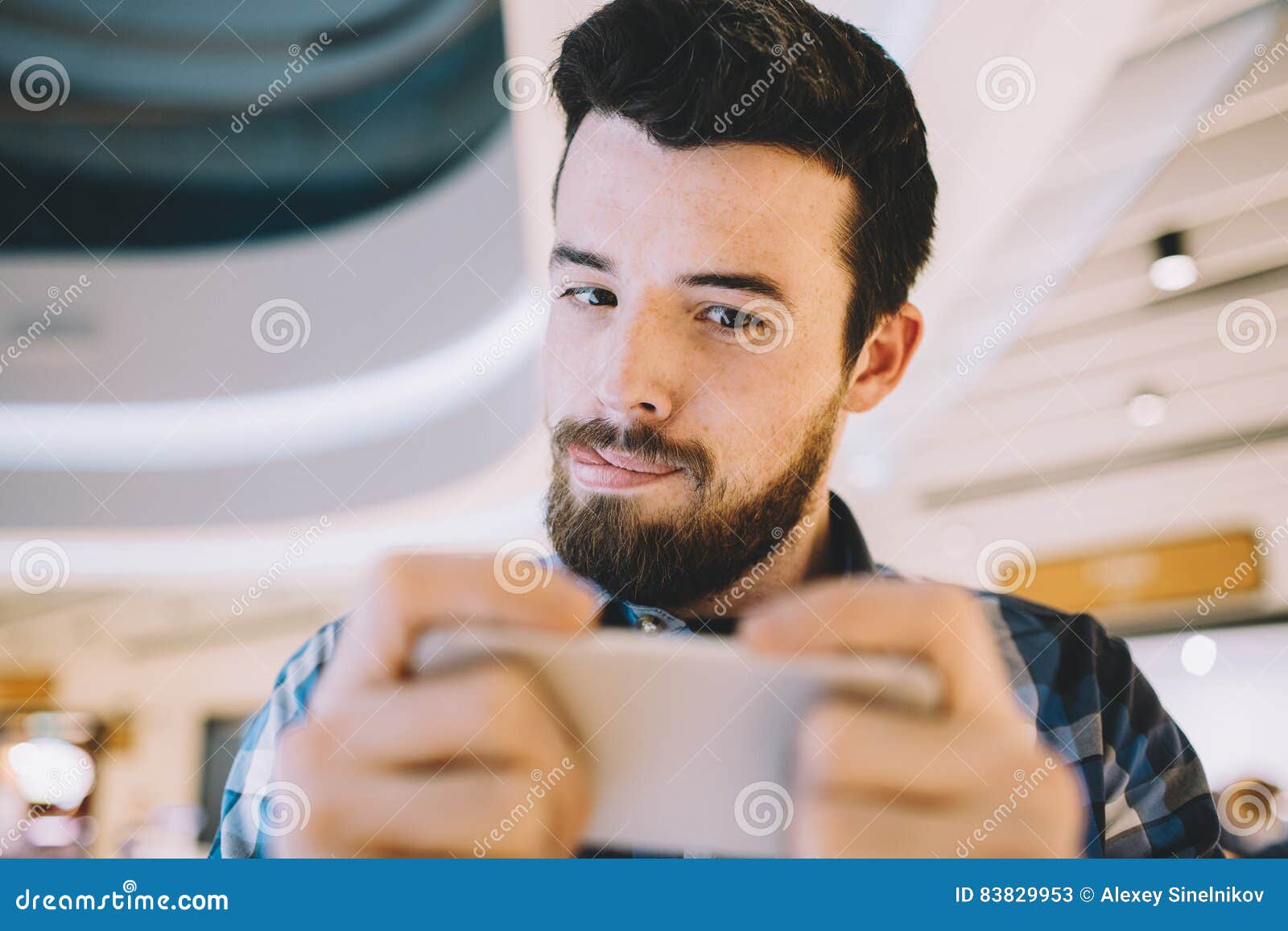 Young Man Taking Picture on His Mobile Phone on Urban Background Stock ...