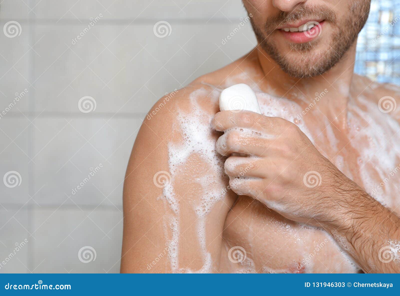 Young Man Taking Shower With Soap In Bathroom Stock Image I