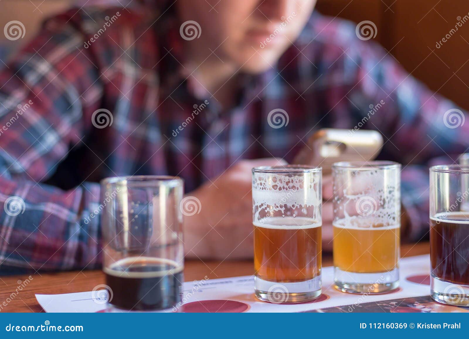 Young Man Checking in Beers on App Stock Image Image of drink, hops