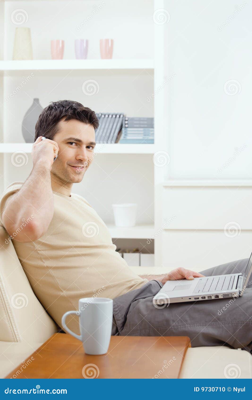 young man teleworking from home