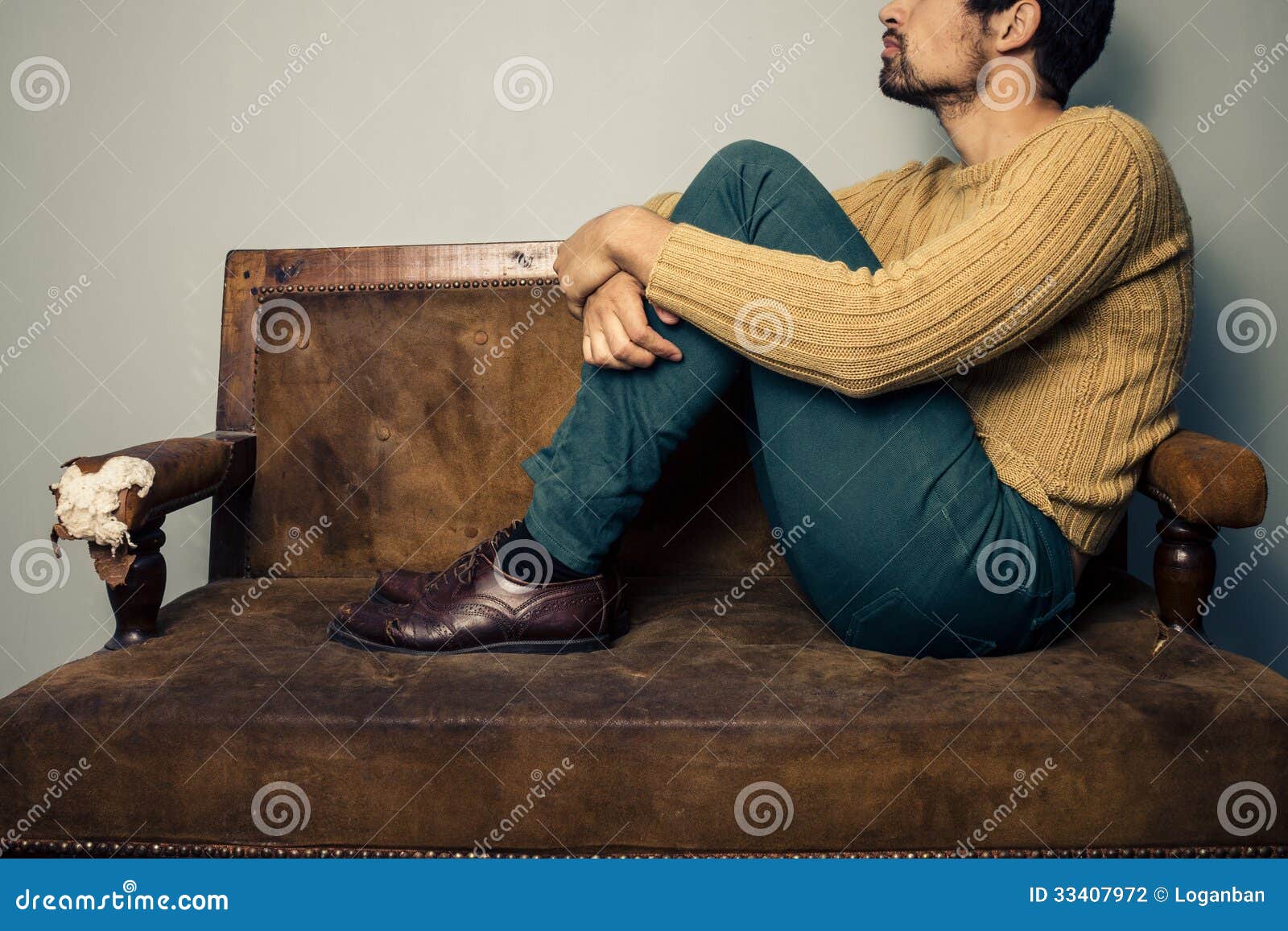 Young Man Thinking on the Couch Stock Photo - Image of idea, living ...