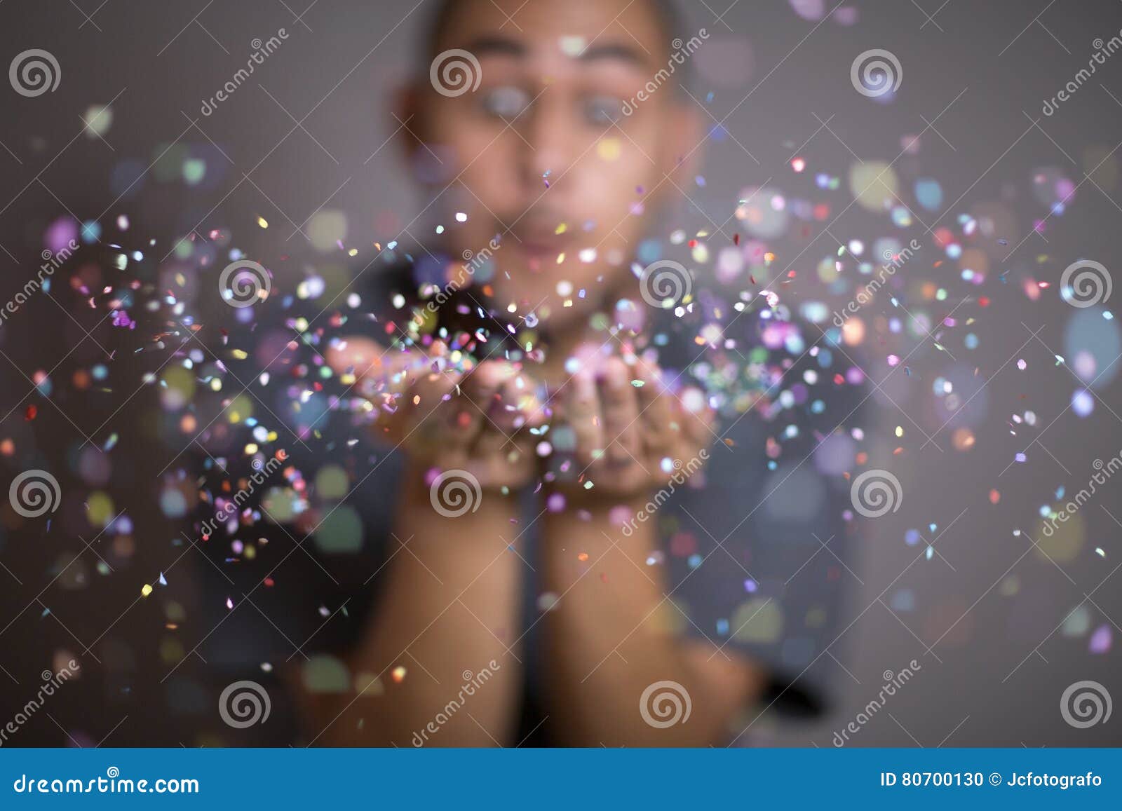 Young Man Throwing Confetti Stock Photo Image of bright, holiday