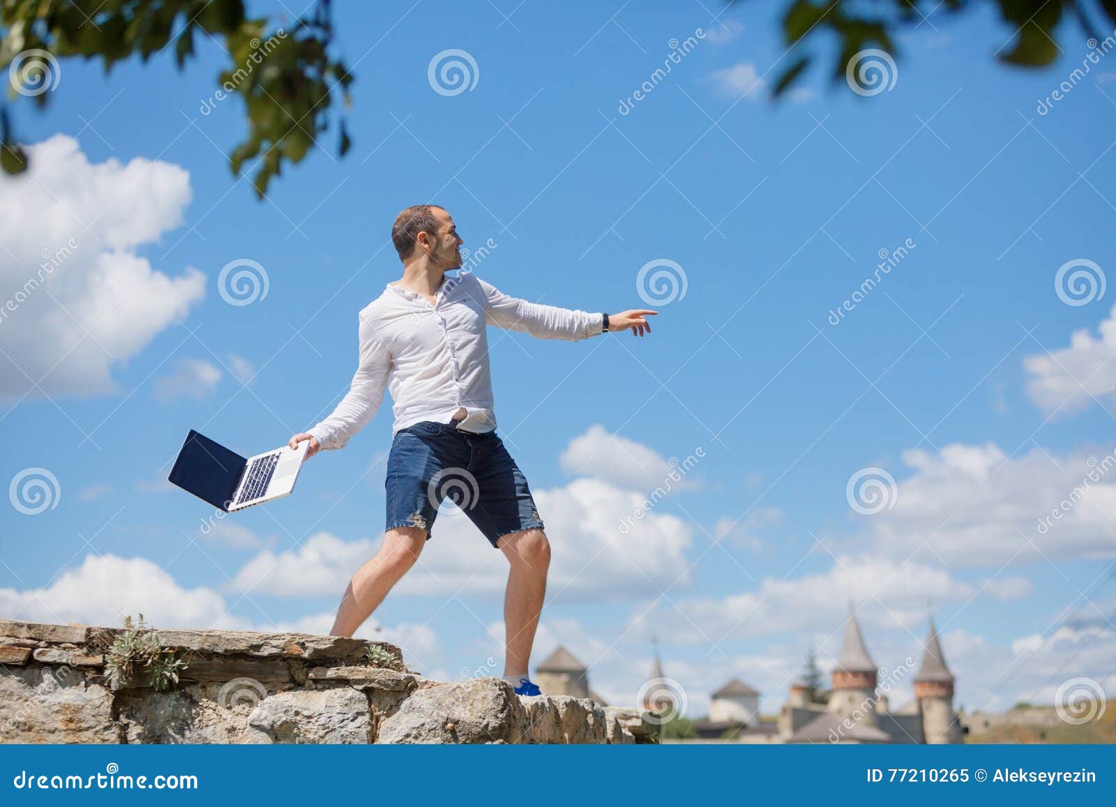 Young man throws a laptop stock image. Image of expression 77210265