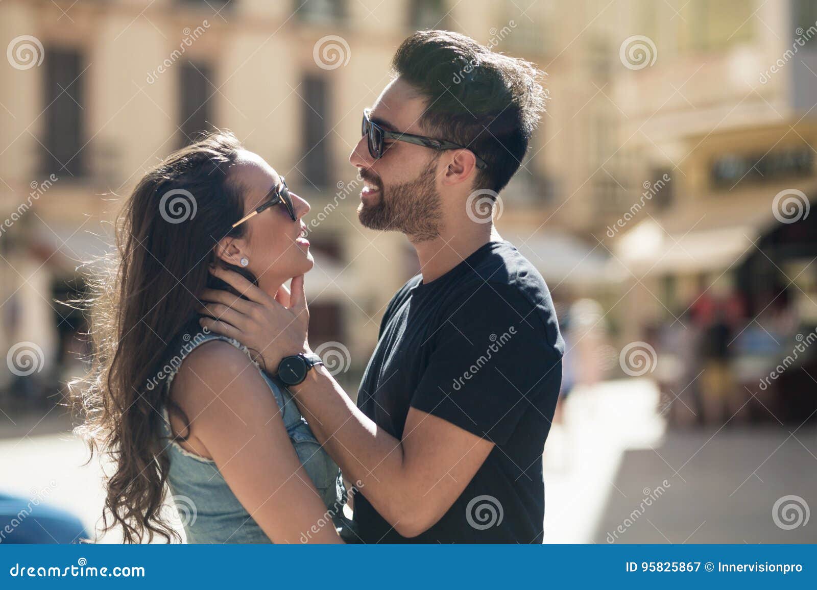 Girlfriend Tenderly Stroking Her Boyfriend, Waking Him Up In Morning