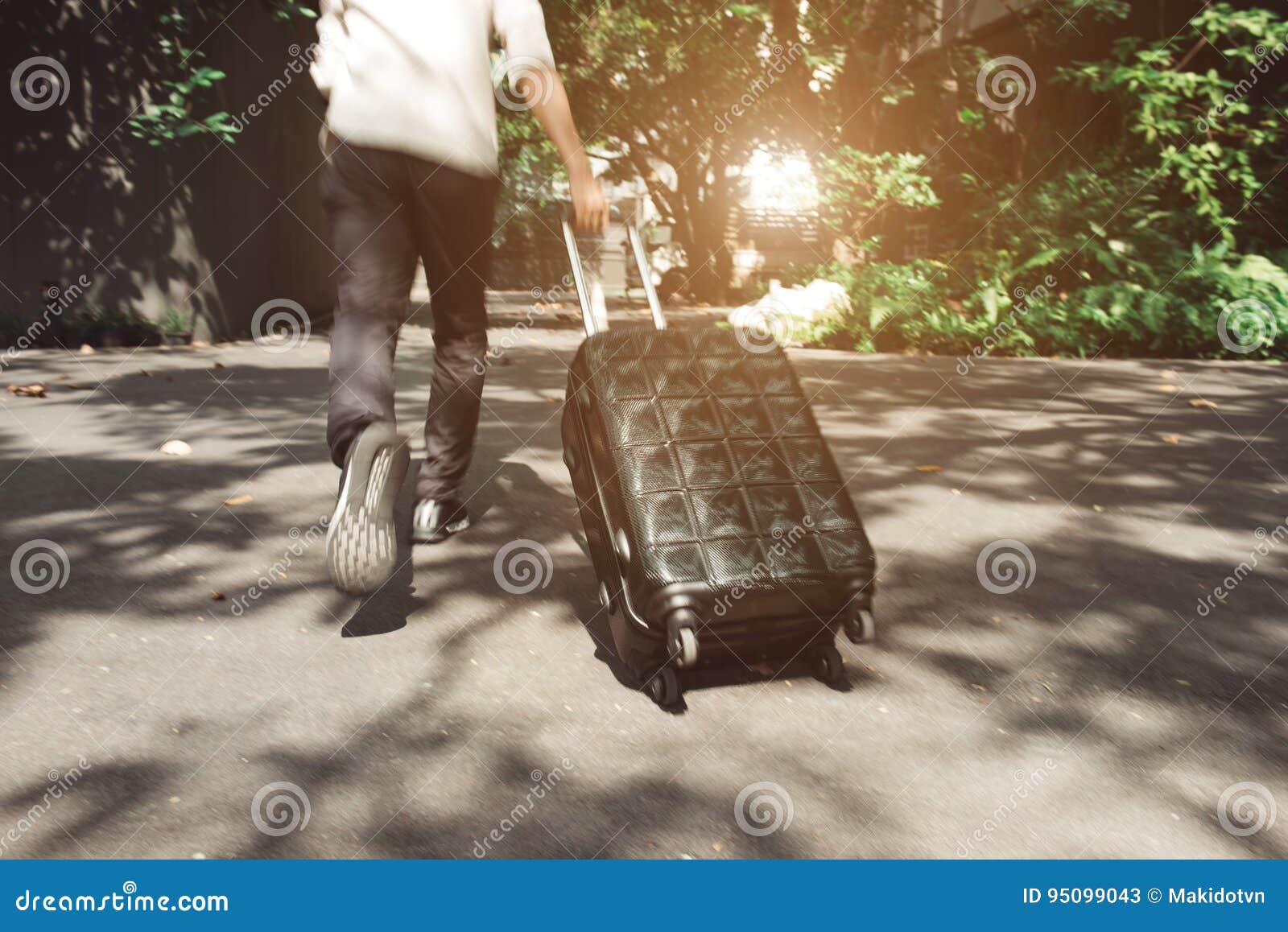 Young Man and Traveling Luggage Suitcase Walking Stock Image Image of