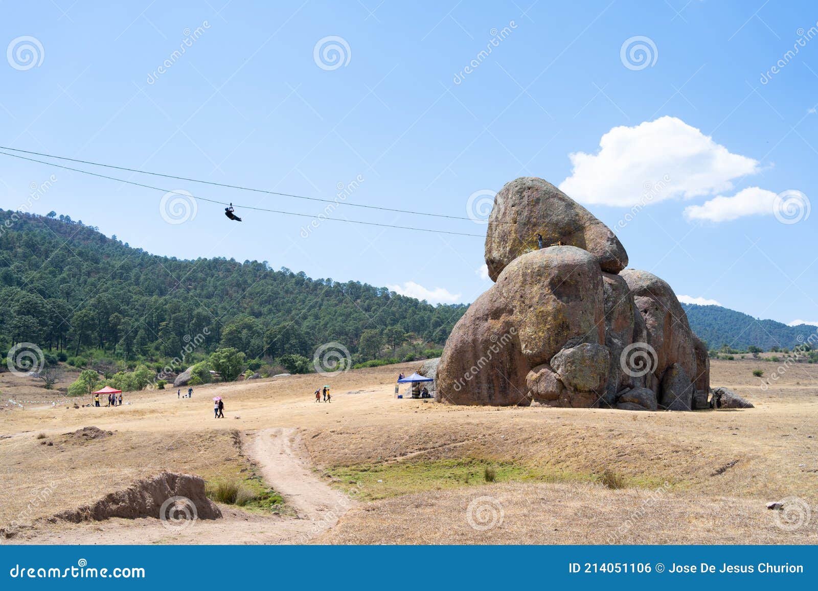 a young man travels on the zip line of the rocks of tapalpa jalisco mexico.