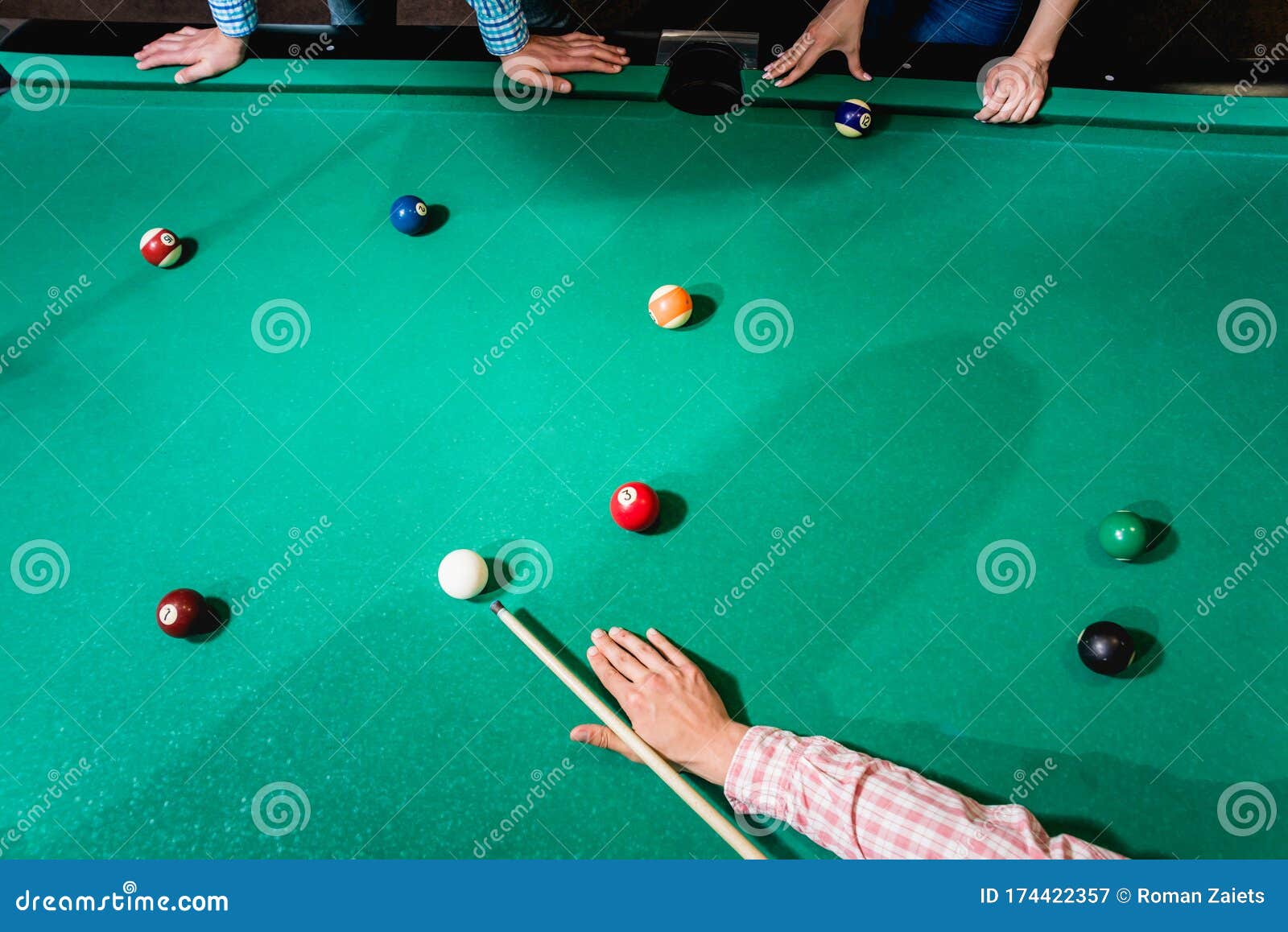 Young Man Trying To Hit the Ball in Billiard. Stock Image Image of