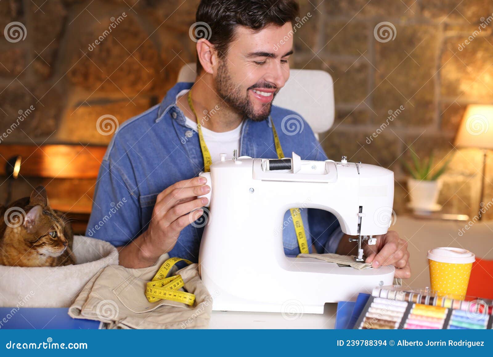 Young Man Using Sewing Machine Stock Photo Image of companion