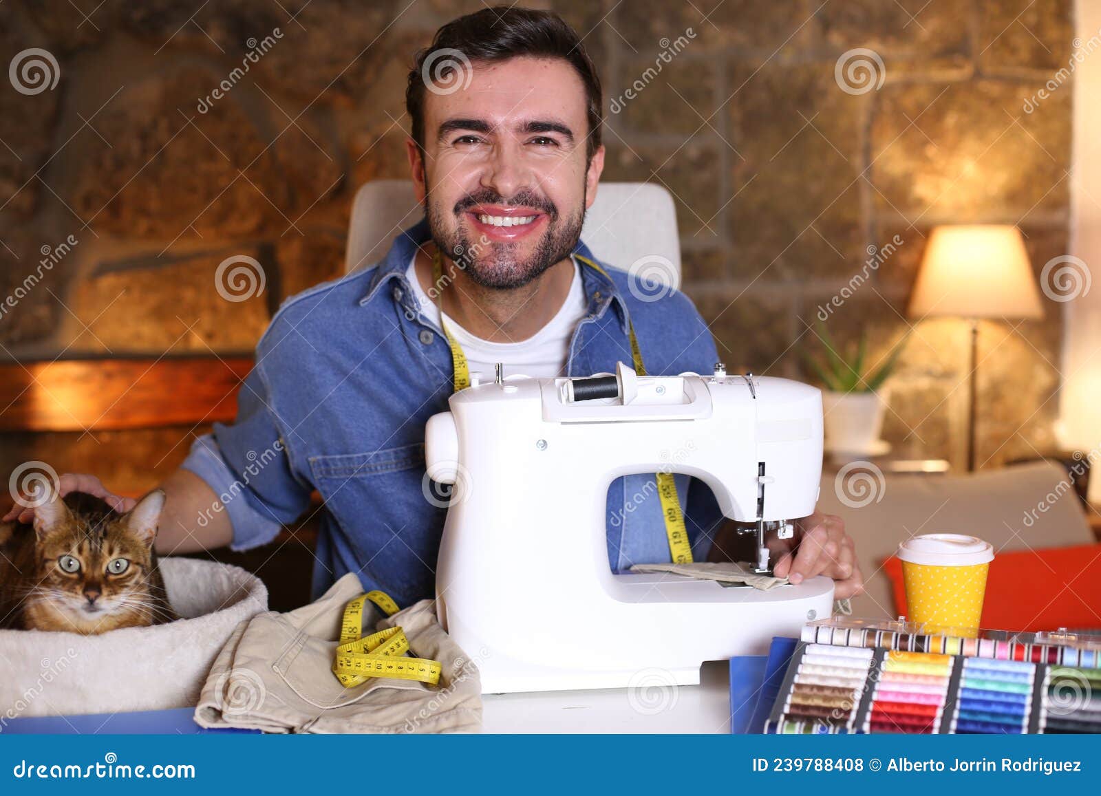 Young Man Using Sewing Machine Stock Photo Image of cloth, fashion