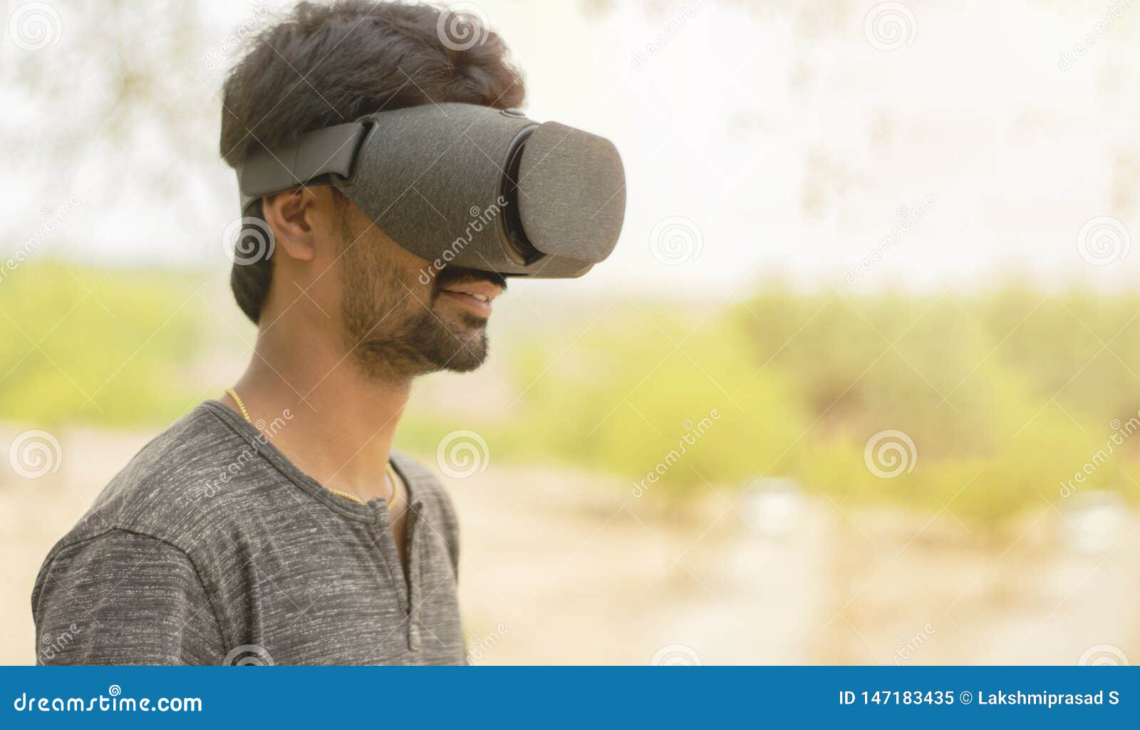 Young Man Using a VR Headset Glasses Outside Stock Image Image of