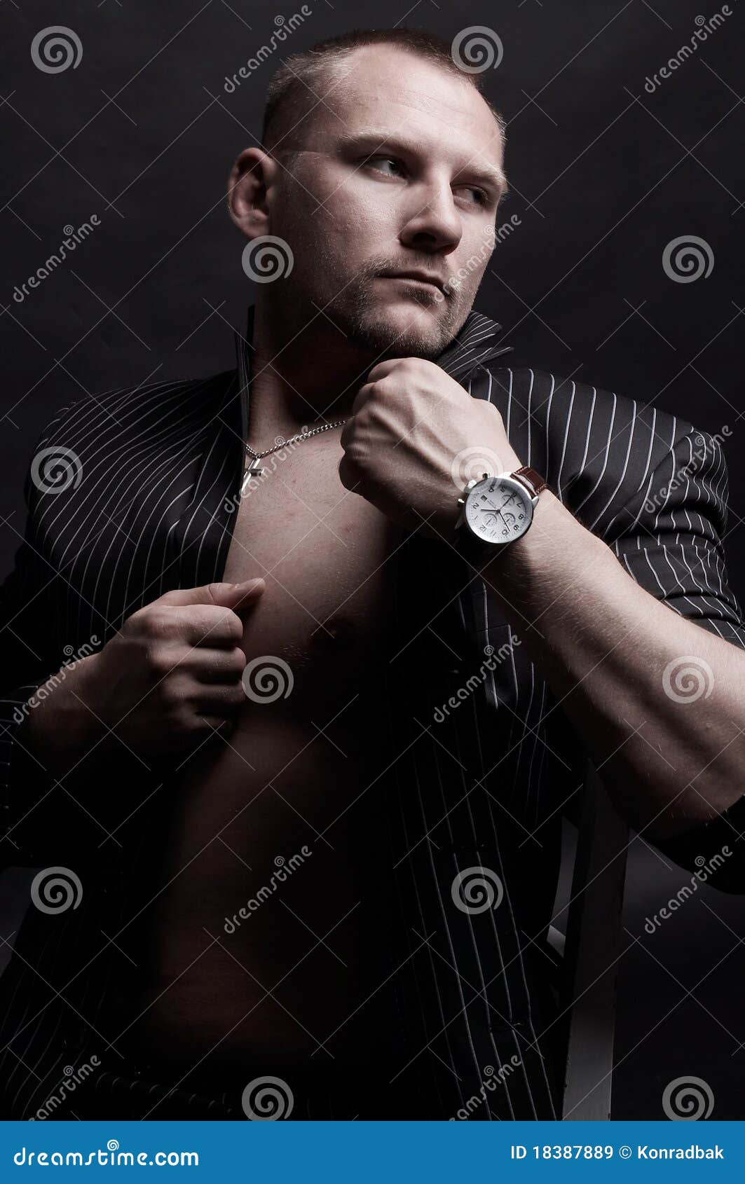 Young man with watch stock image. Image of cool, model 18387889