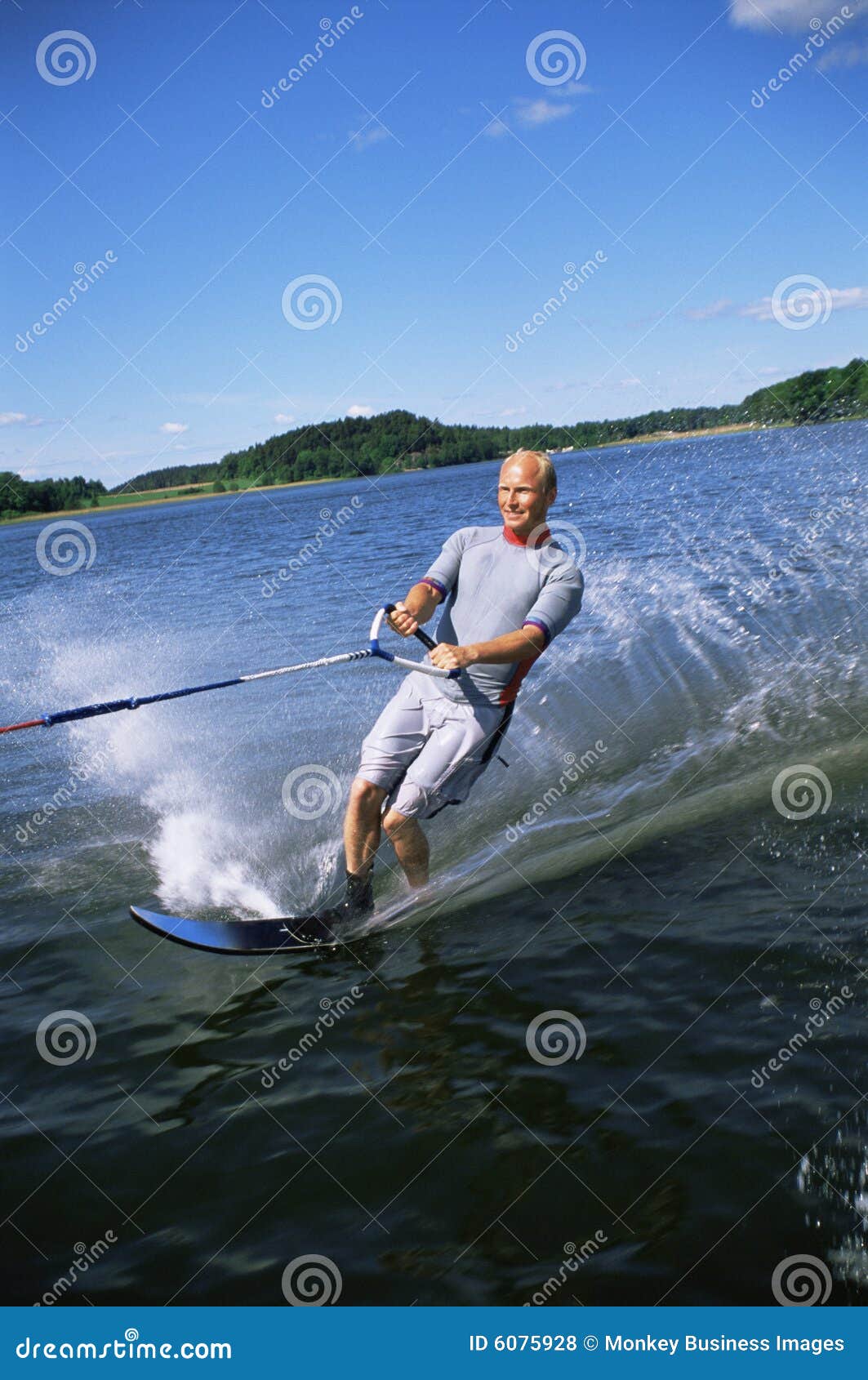 A young man water skiing stock photo. Image of water, caucasian 6075928