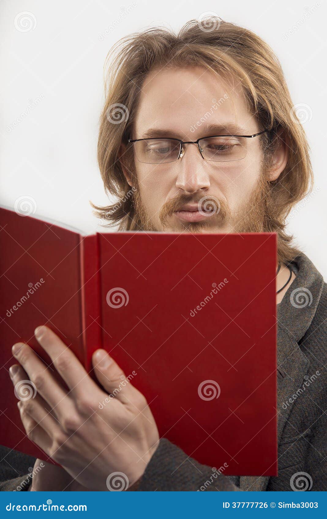 Young Man Wearing Glasses Reading a Book Stock Photo Image of casual