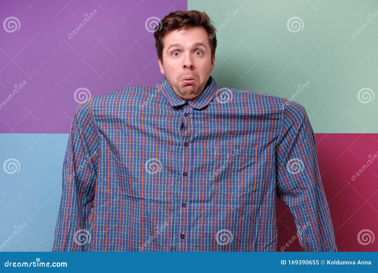 Young Man Wearing a Very Large Shirt after Diet. Stock Image - Image of ...