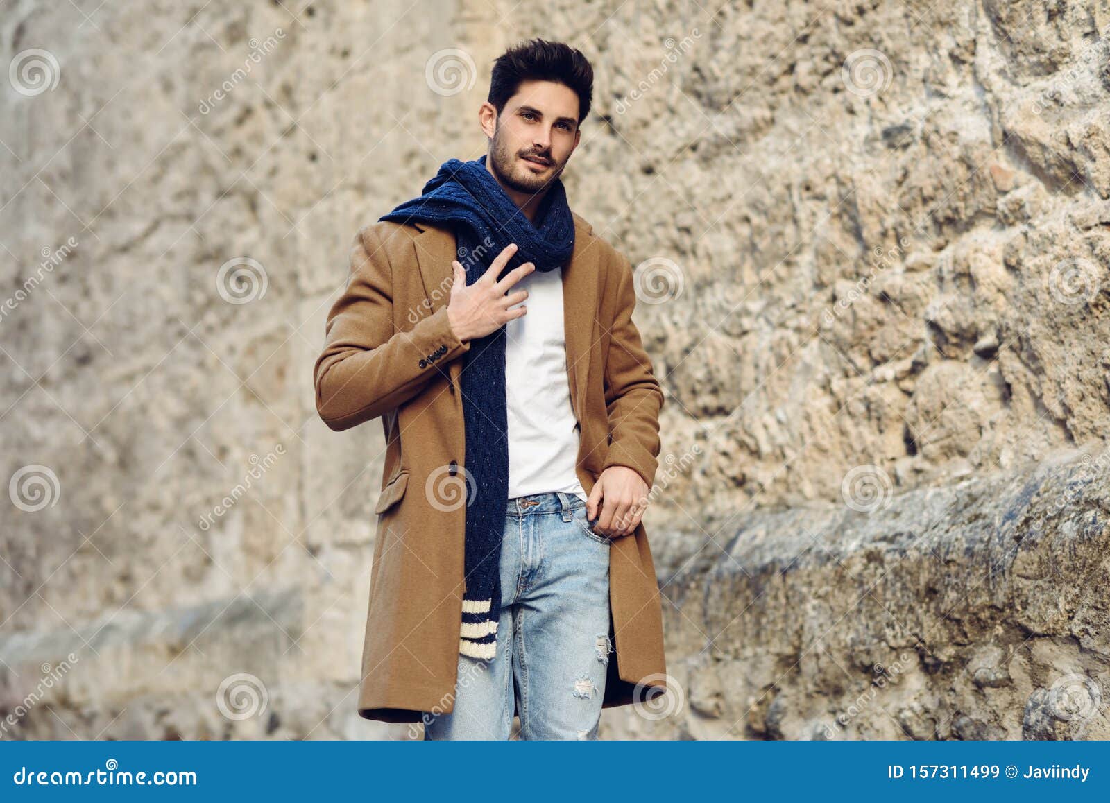 Young Man Wearing Winter Clothes in the Street. Stock Image - Image of ...