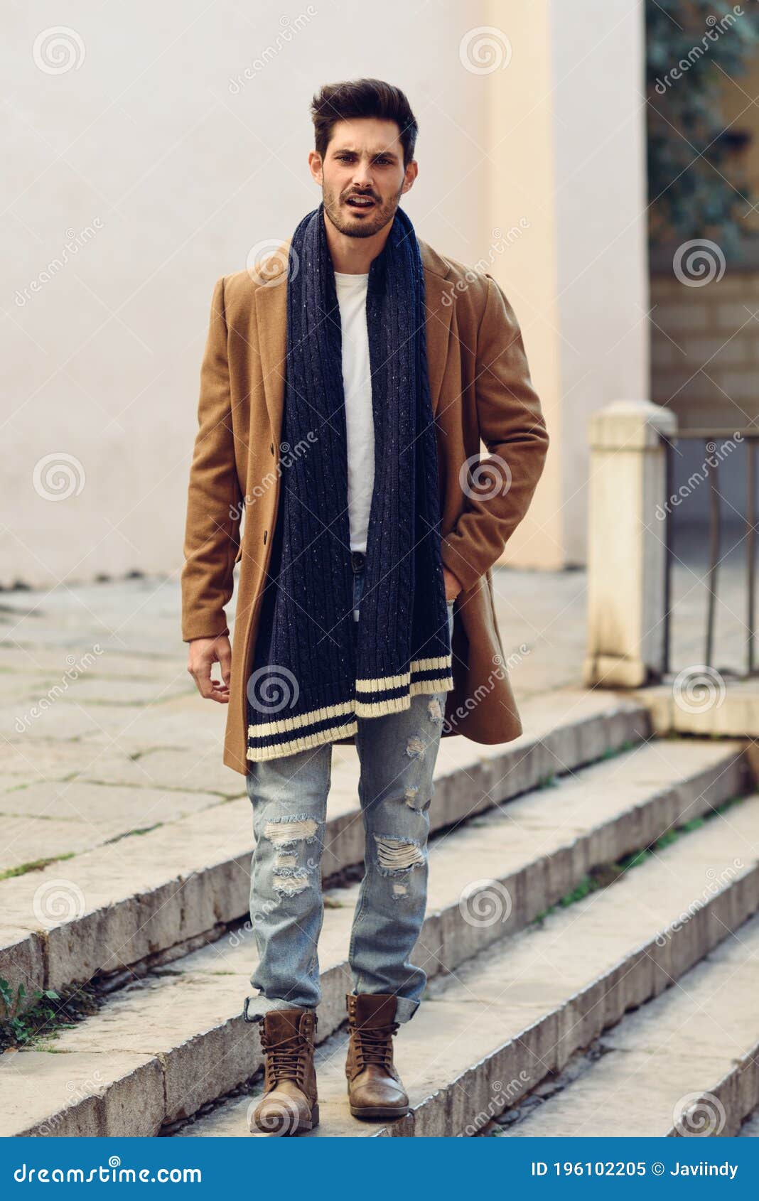 Young Man Wearing Winter Clothes in the Street. Stock Image - Image of ...