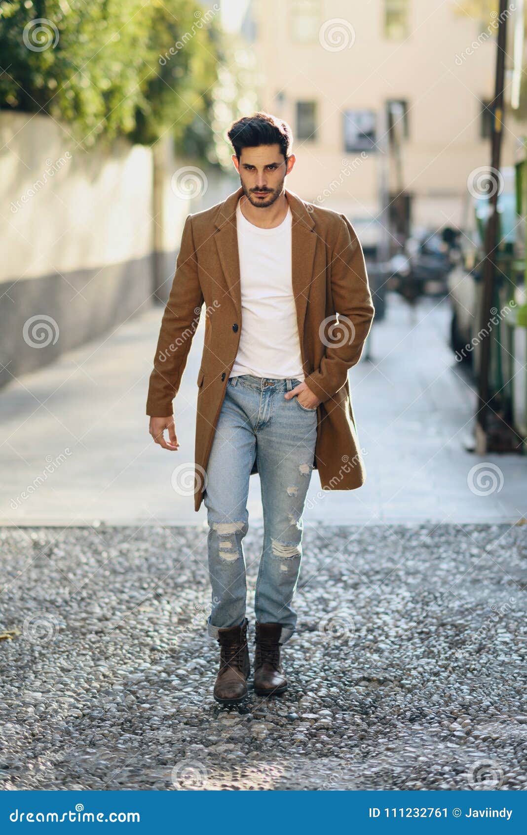 Young Man Wearing Winter Clothes in the Street. Stock Image - Image of ...