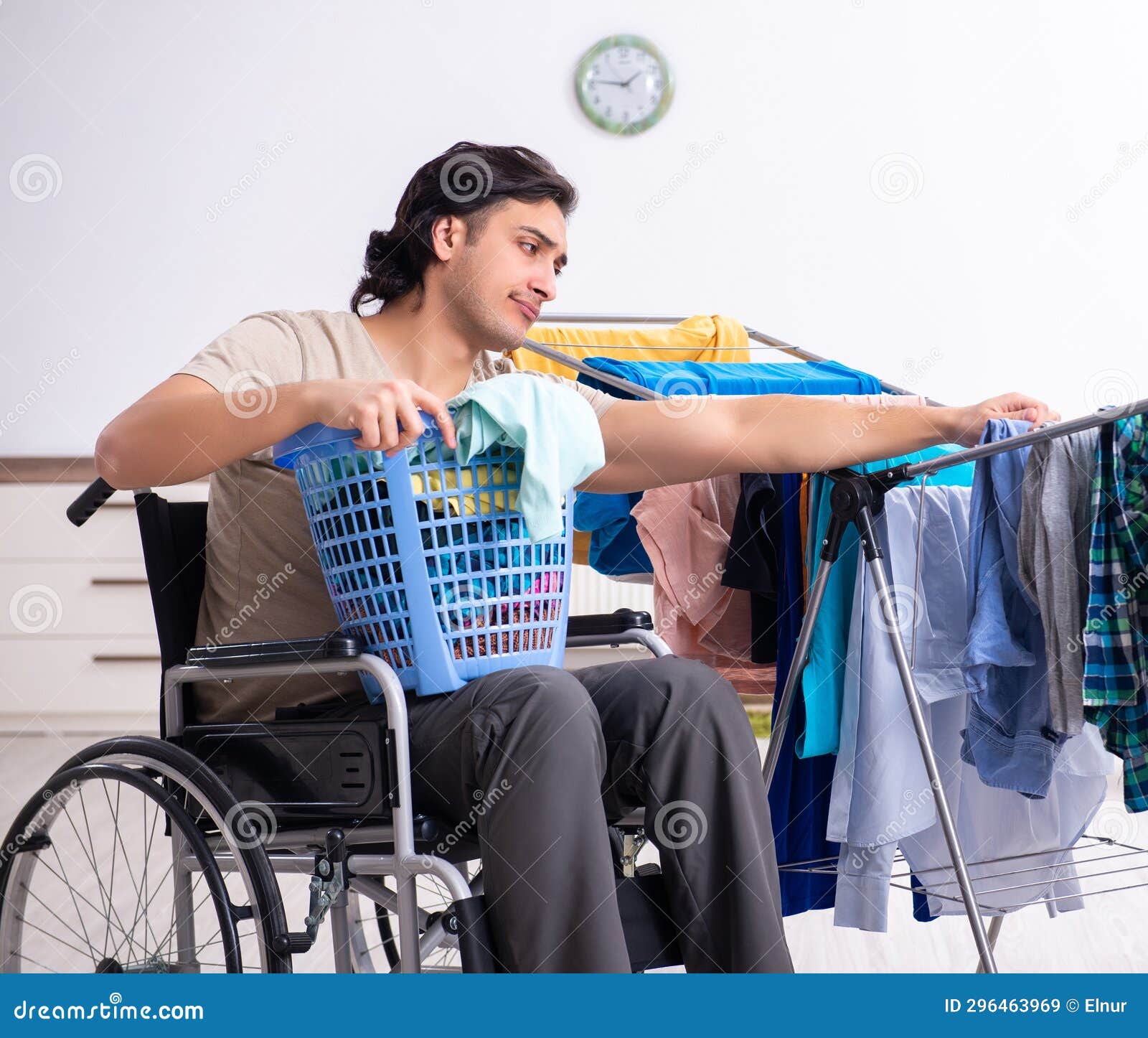 Young Man in Wheelchair Doing Ironing at Home Stock Image Image of