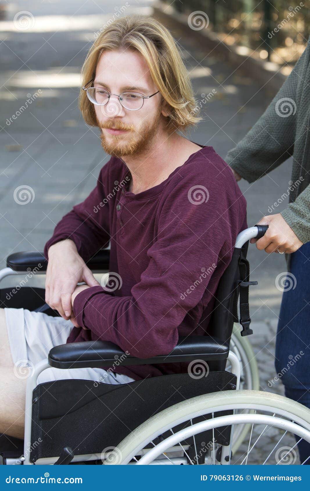Young Man in Wheel Chair Looking Sad Stock Photo Image of person