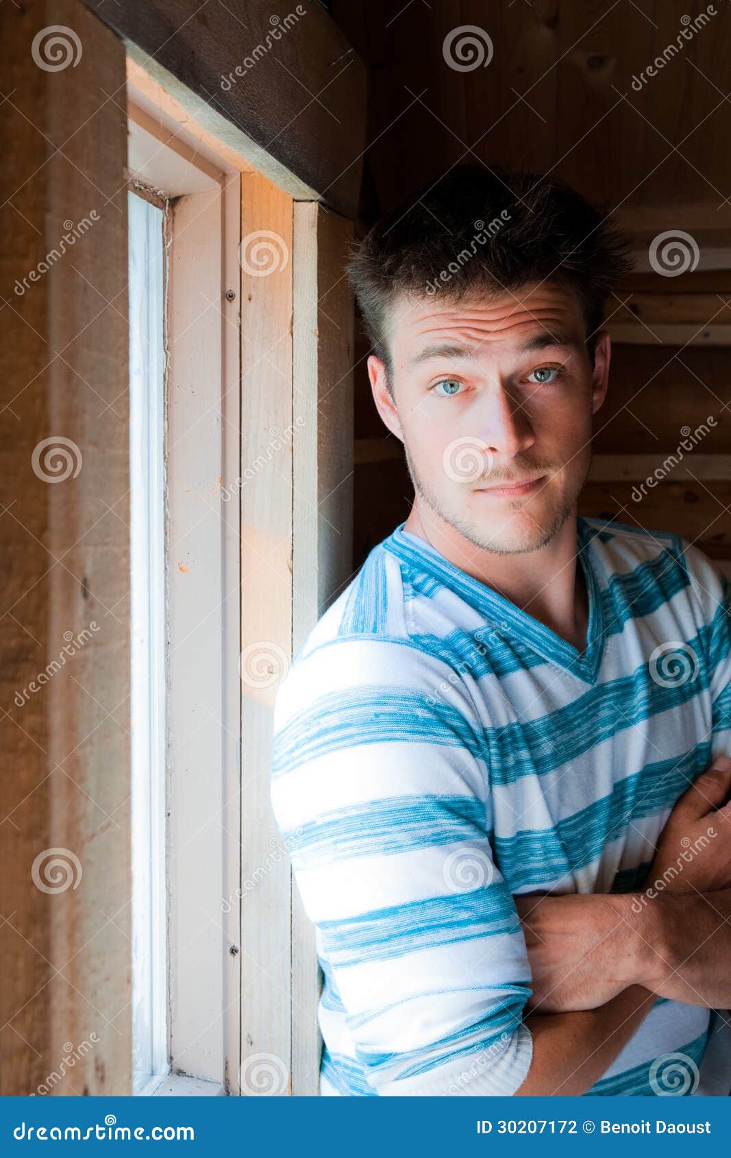 Young man at the window stock photo. Image of casual - 30207172