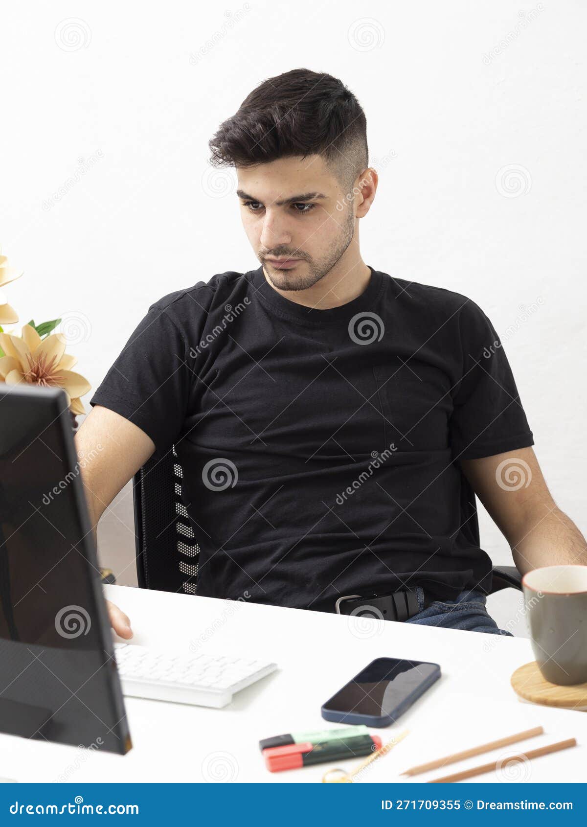 Young Man Working in His Home