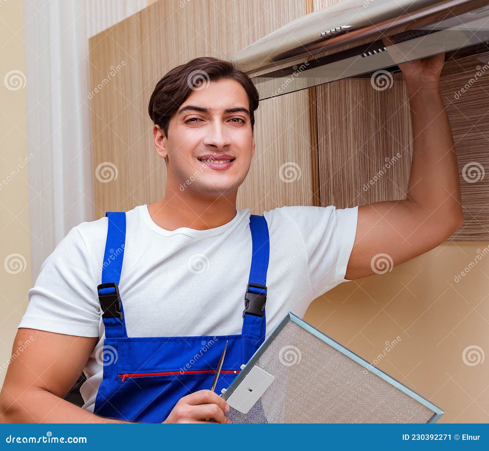 Young Man Working with Kitchen Equipment Stock Image Image of