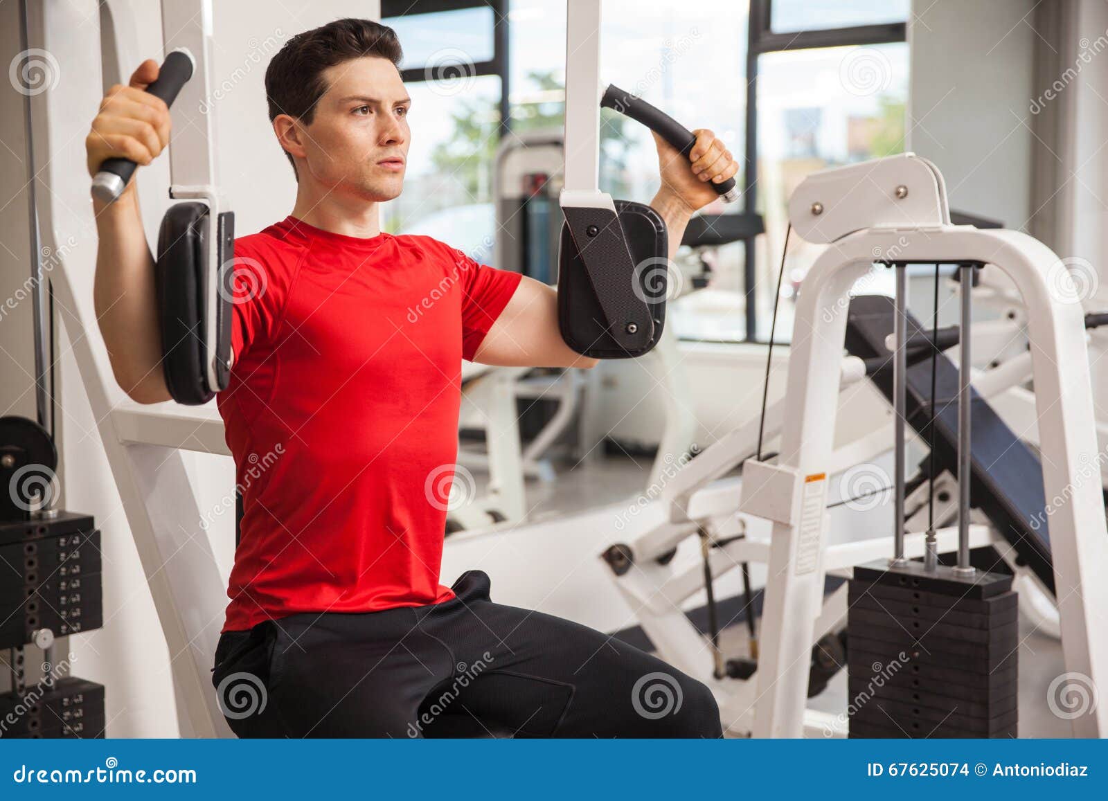 Young Man Working Out at the Gym Stock Photo Image of exercise