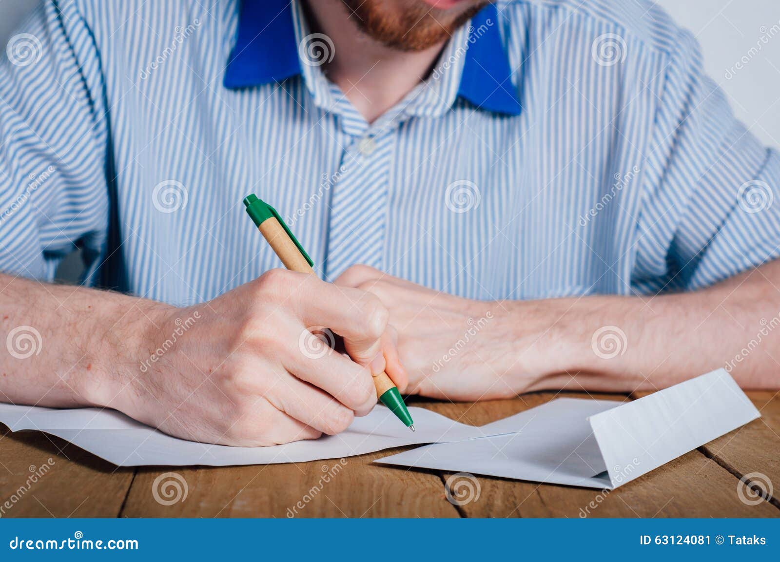 Young man writing letter stock image. Image of ideas - 63124081