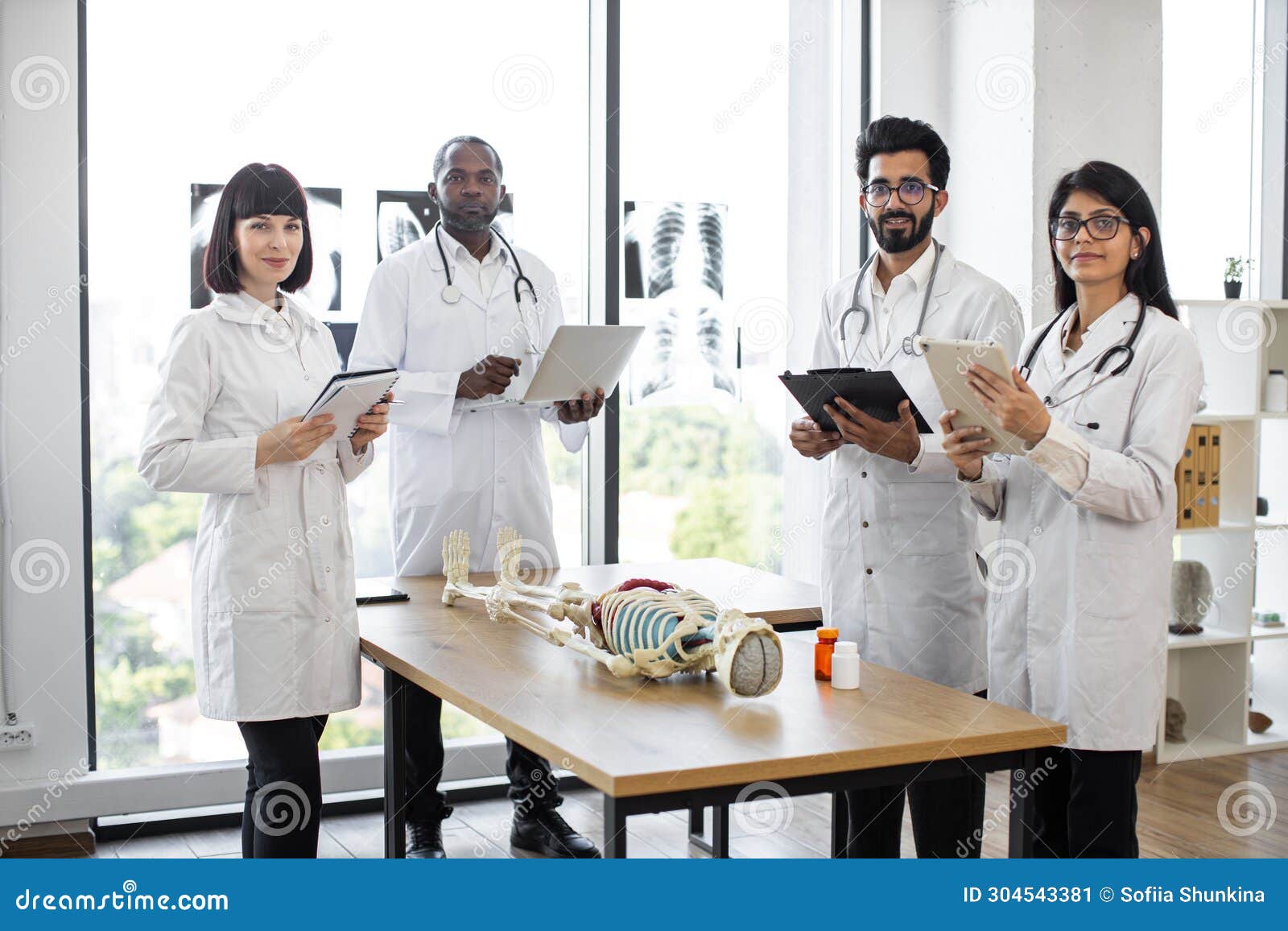 Young Medical Students on Anatomy Lesson in Classroom Looking at Camera ... Biology Diagrams