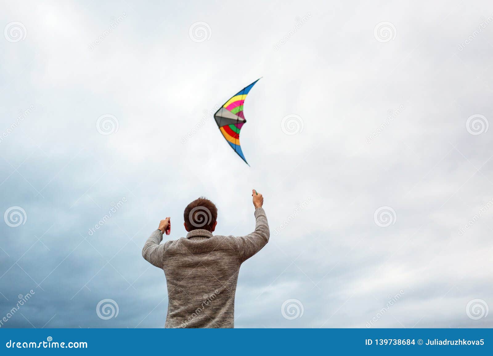 Young Men Flying a Kite on the Beach Stock Photo Image of play