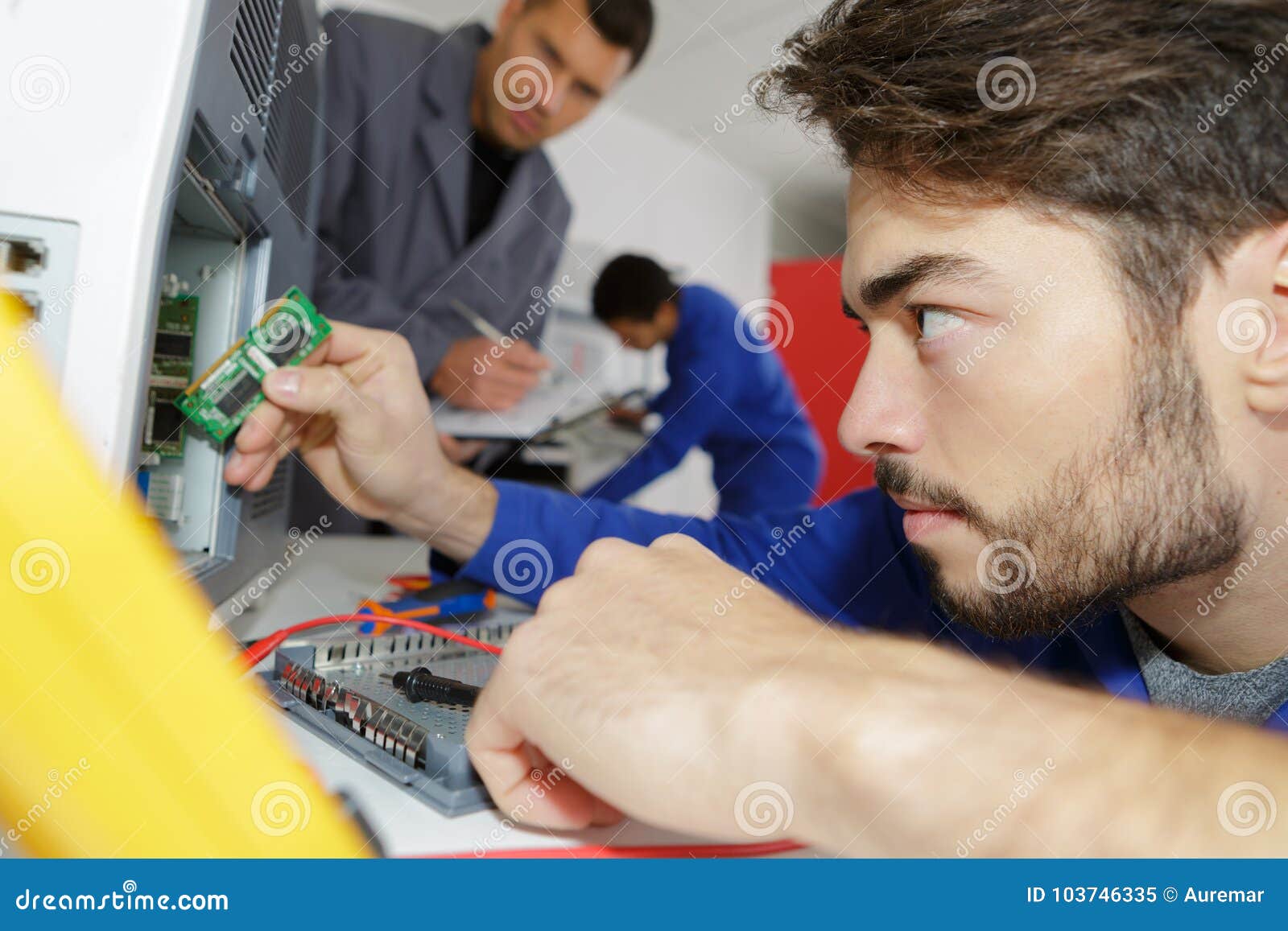 Young Man Repairs Electronic Device Stock Image Image of industrial