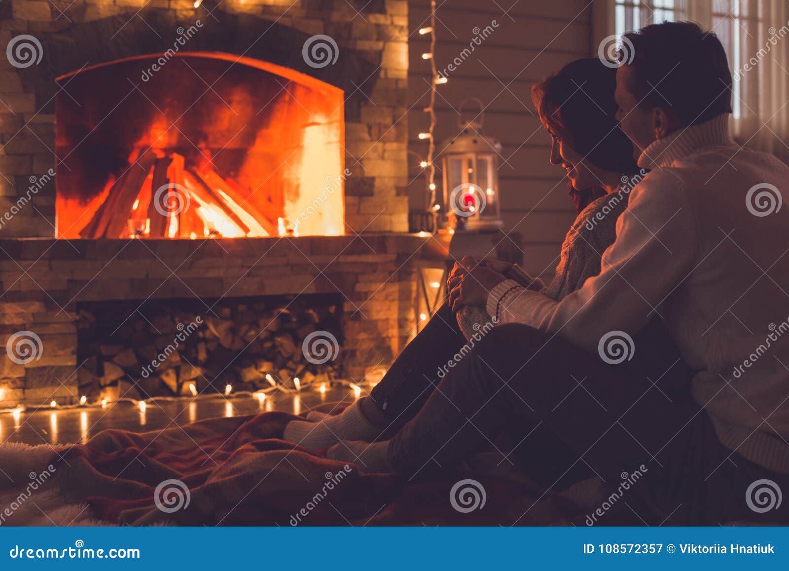 Threesome near fireplace